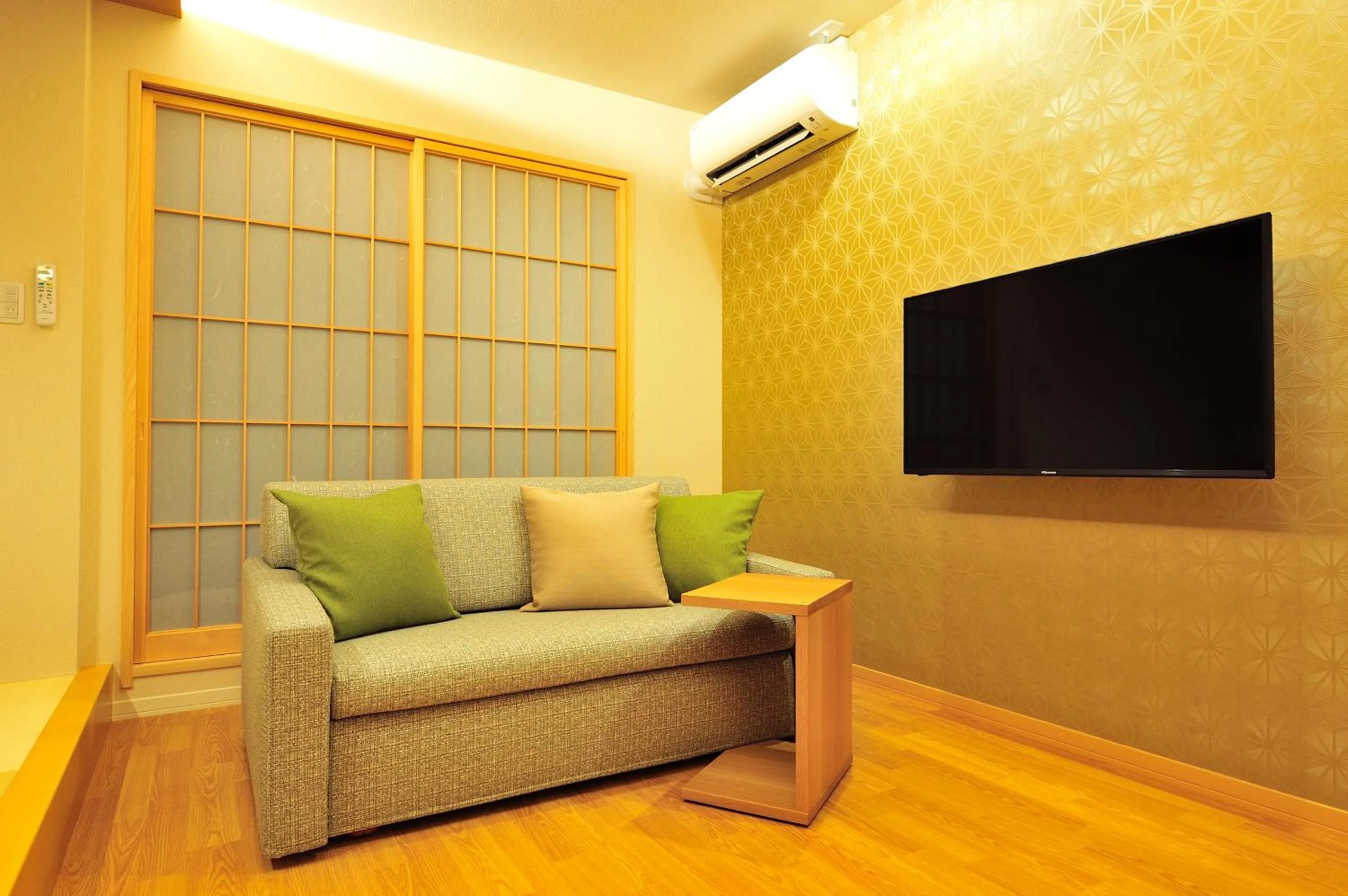 Communal lounge/ TV room in Rakuten STAY x Shamaison Osaka Dekijima Station