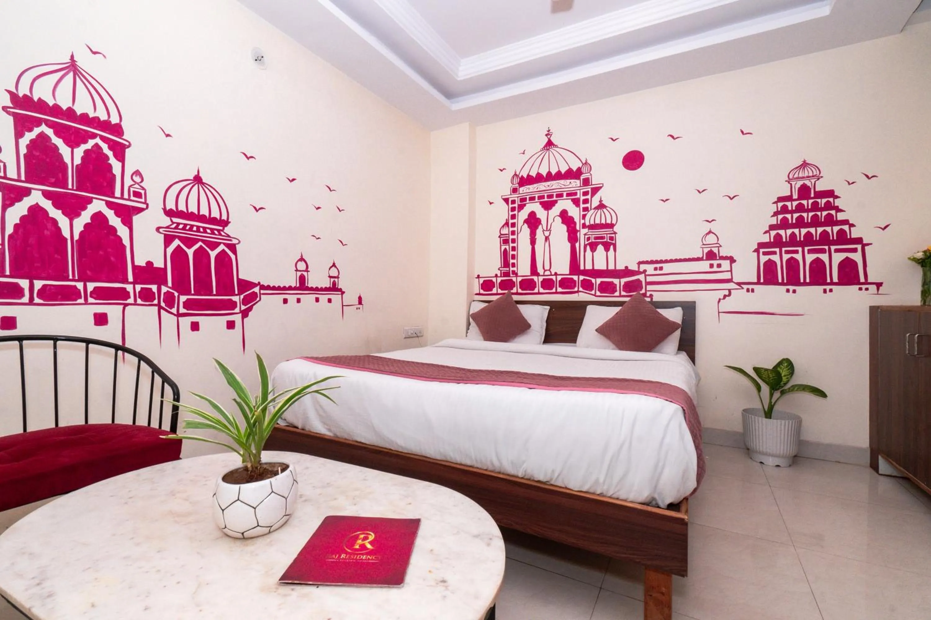 Bed in Raj Residency