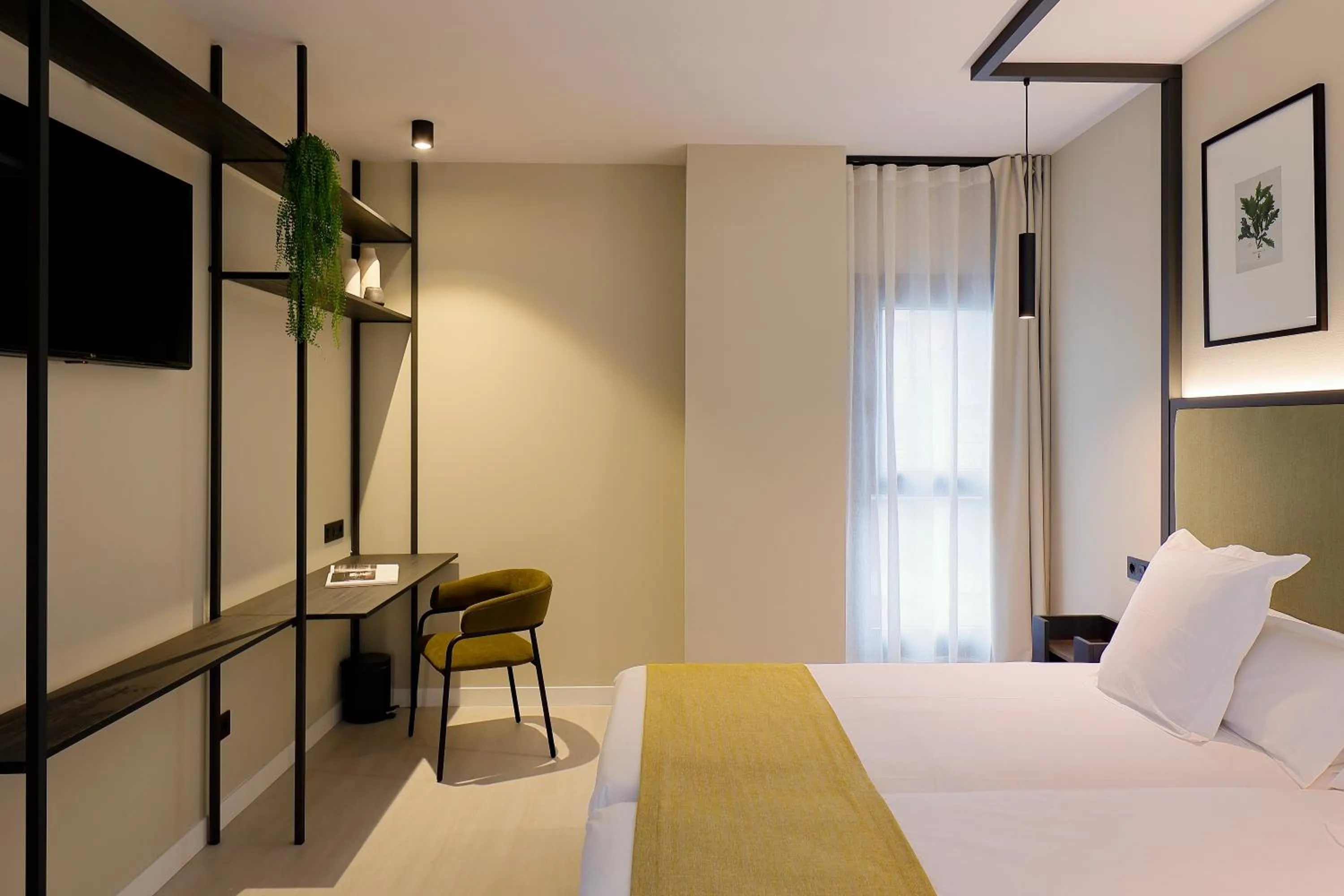 Bed in Nuvō Hotel Boutique