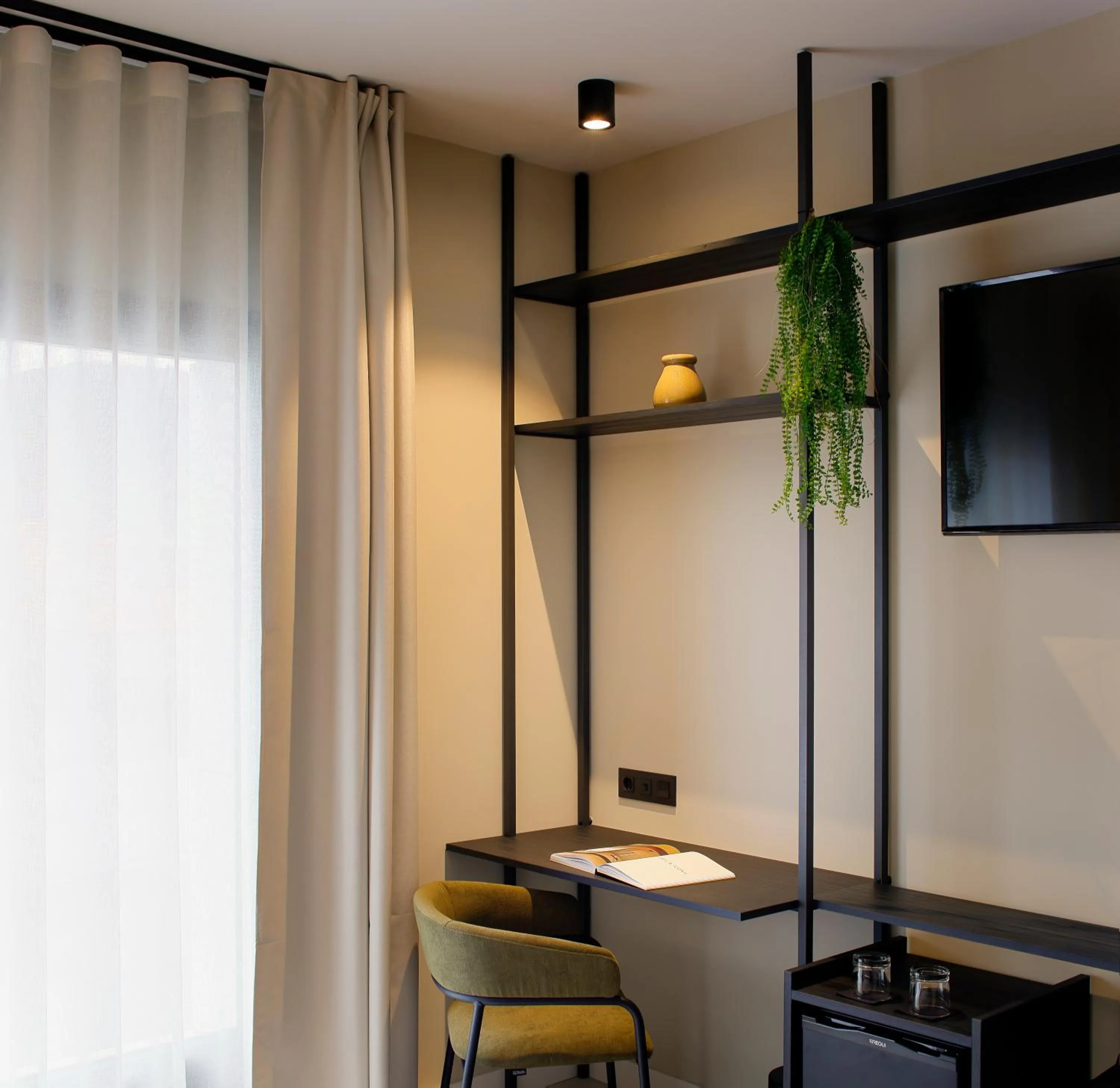 TV and multimedia in Nuvō Hotel Boutique