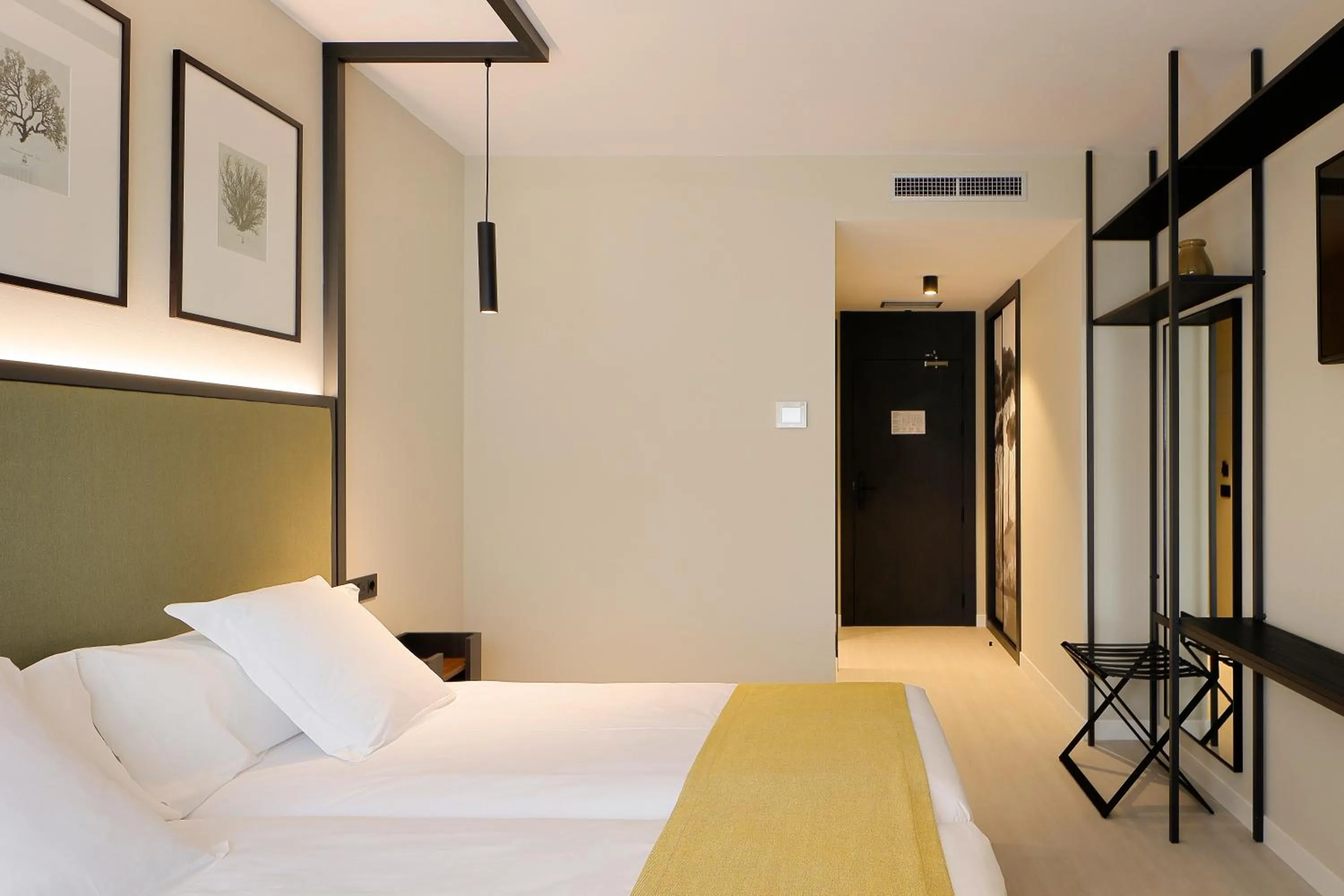 Photo of the whole room, Bed in Nuvō Hotel Boutique