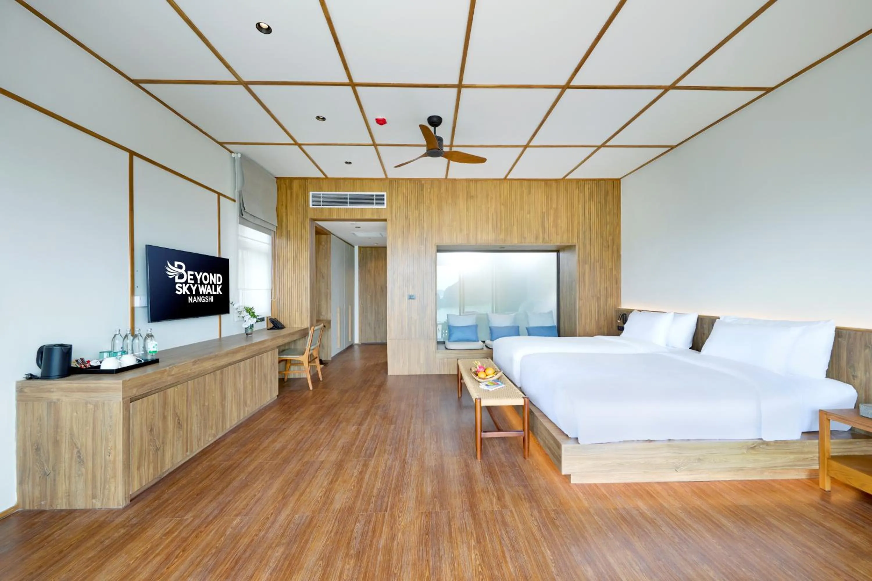 Photo of the whole room, Bed in Beyond Skywalk Nangshi
