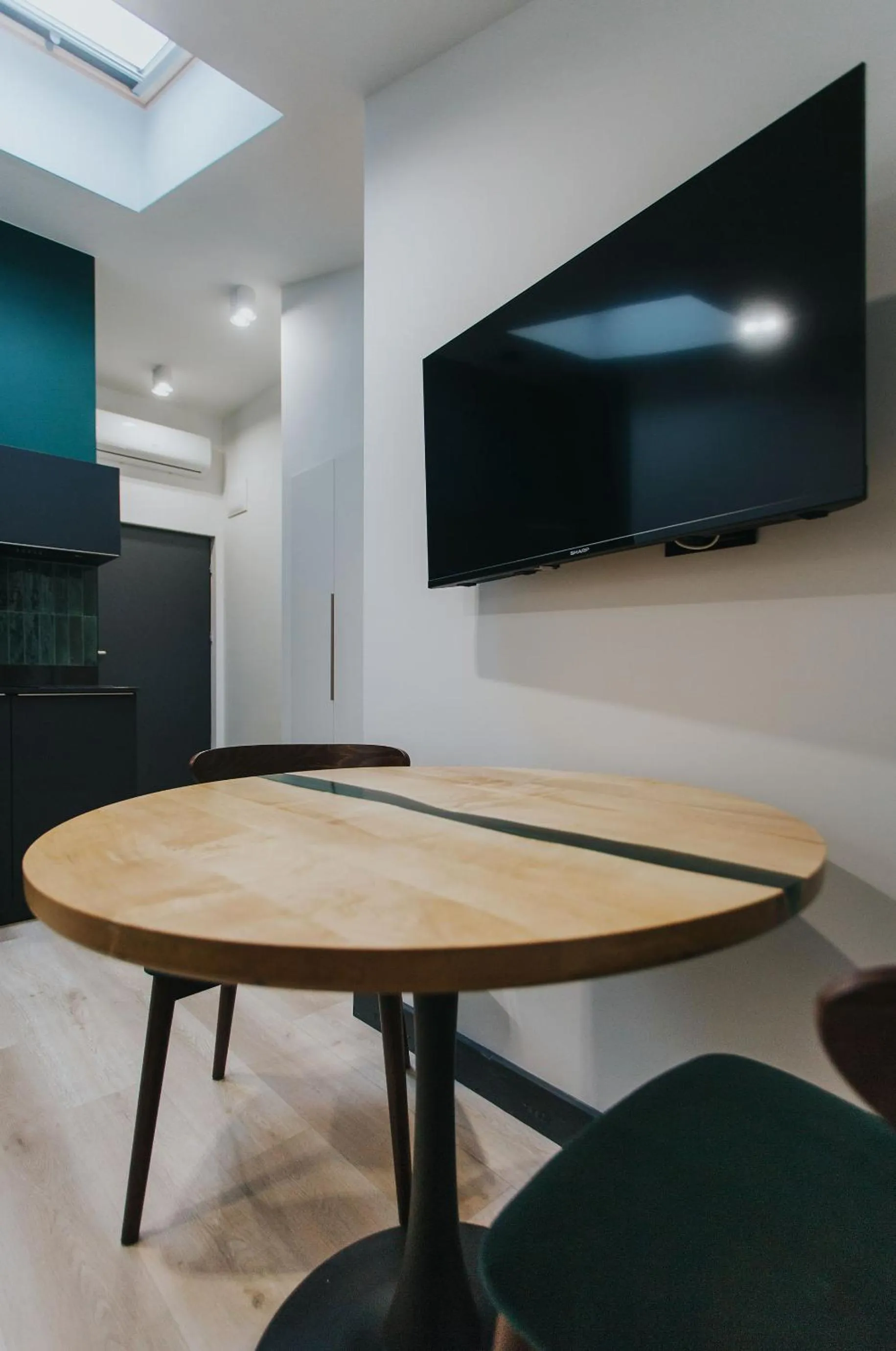 Communal lounge/ TV room in Apartamenty BIBLIO