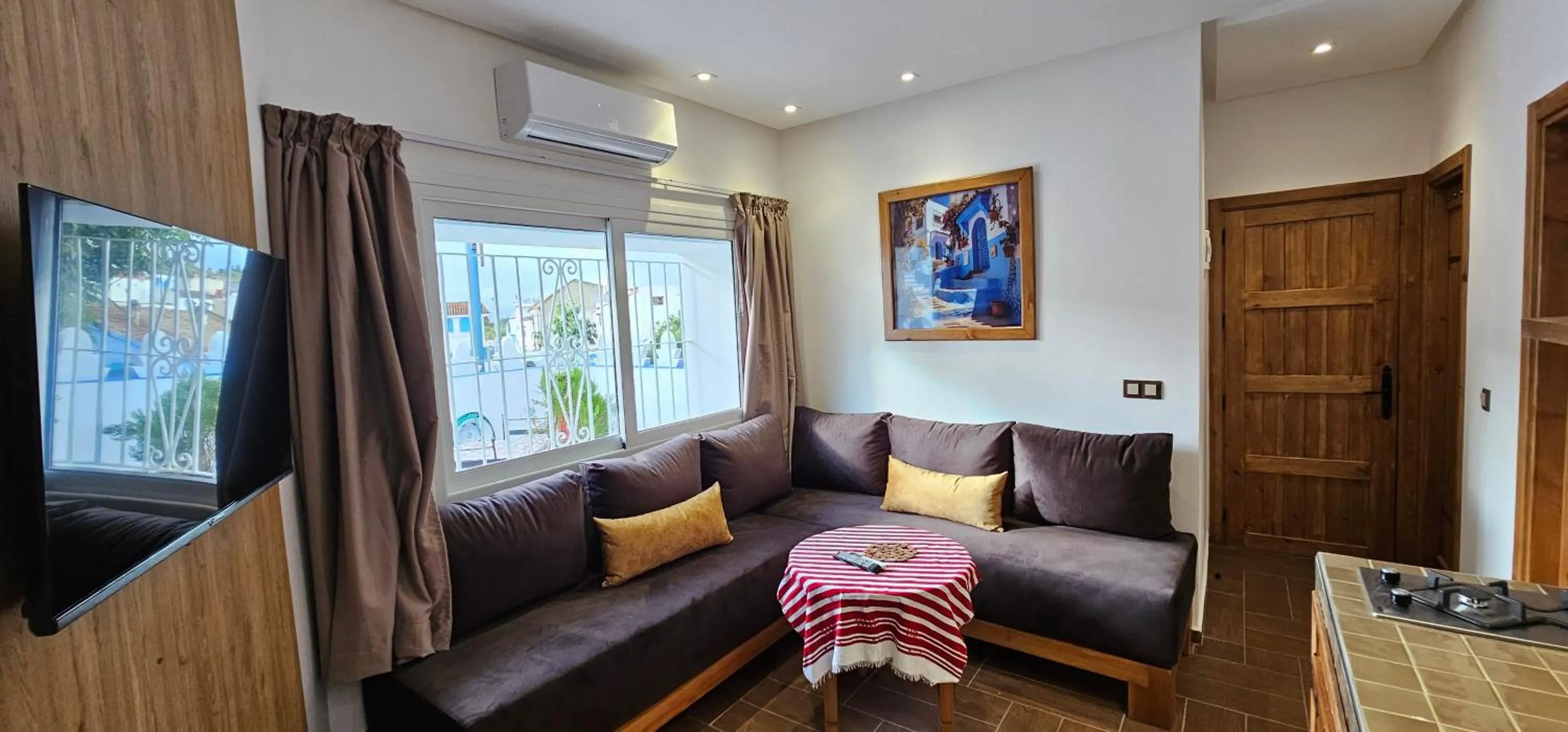 TV and multimedia in Aparthotel Dar Nowara Chaouen