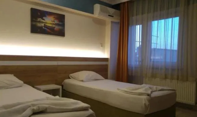 Bed in Grand Ece Hotel