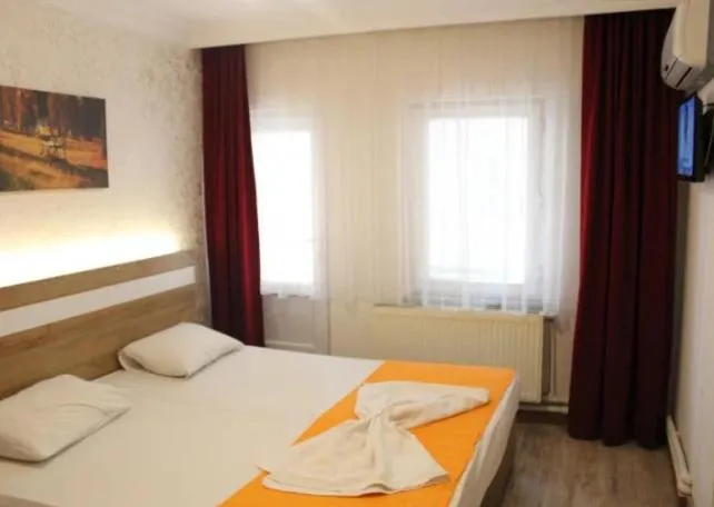 Bed in Grand Ece Hotel