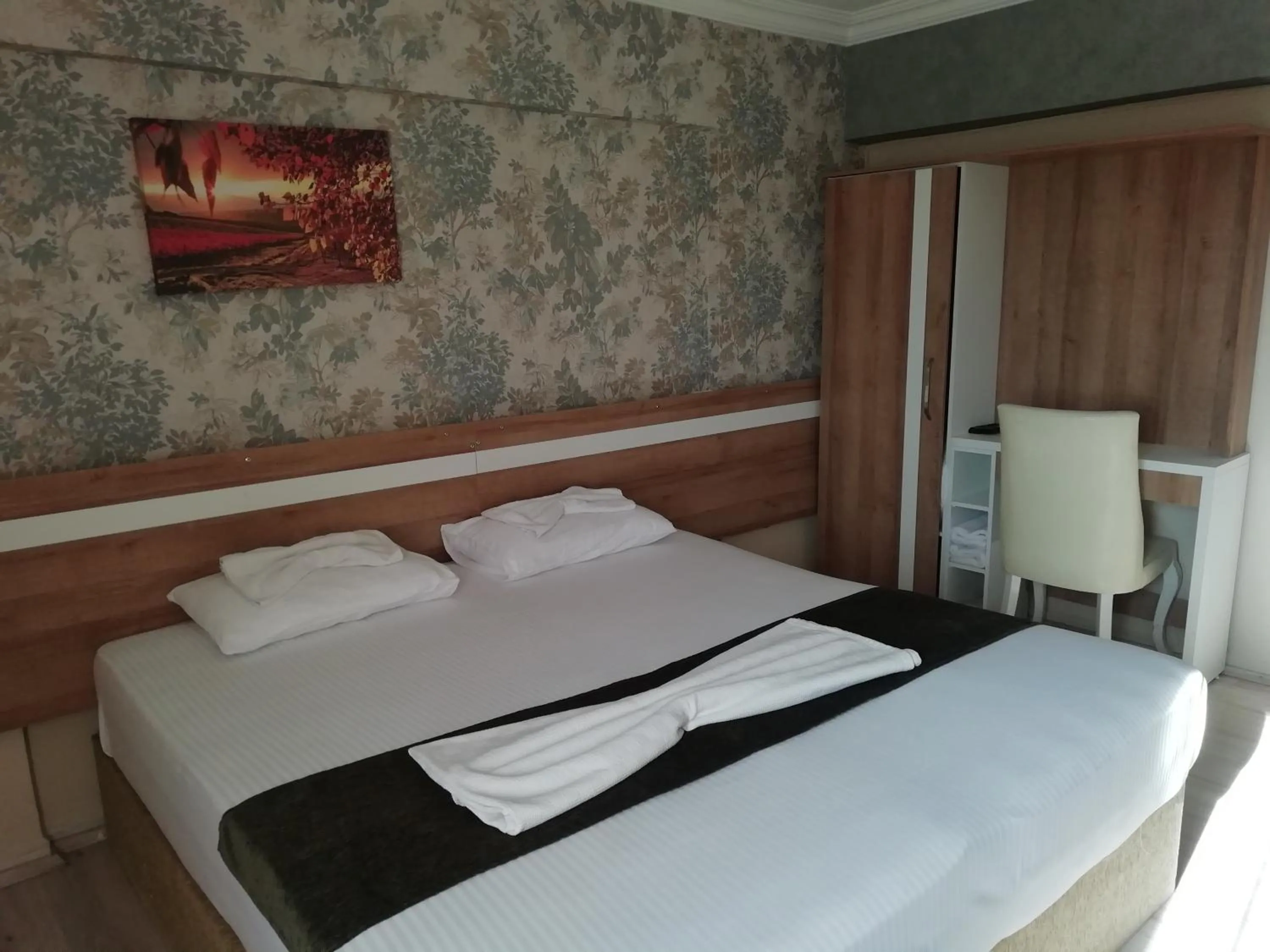 Bed in Grand Ece Hotel