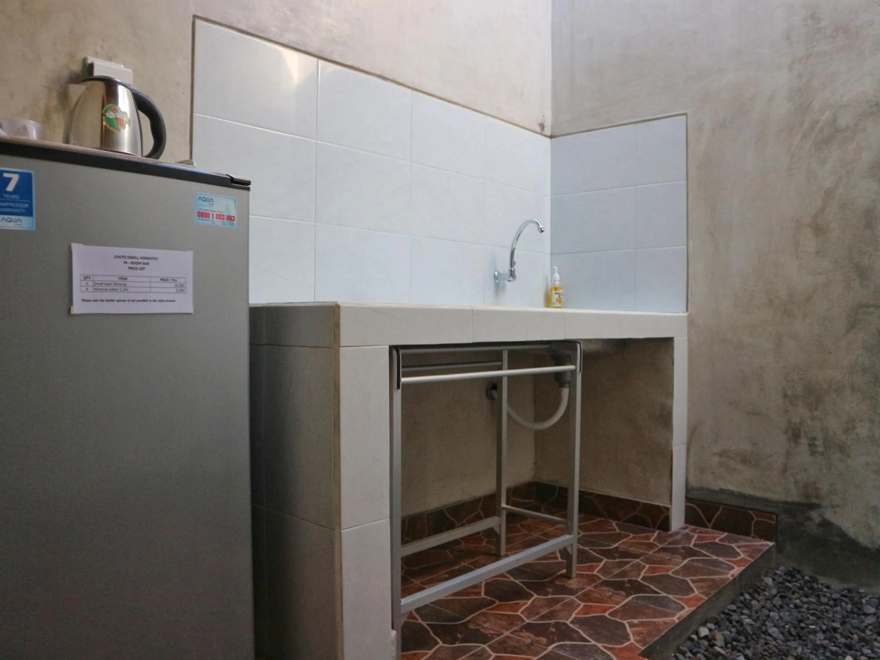 Kitchen or kitchenette in Louto Dmell Villa & Guesthouse