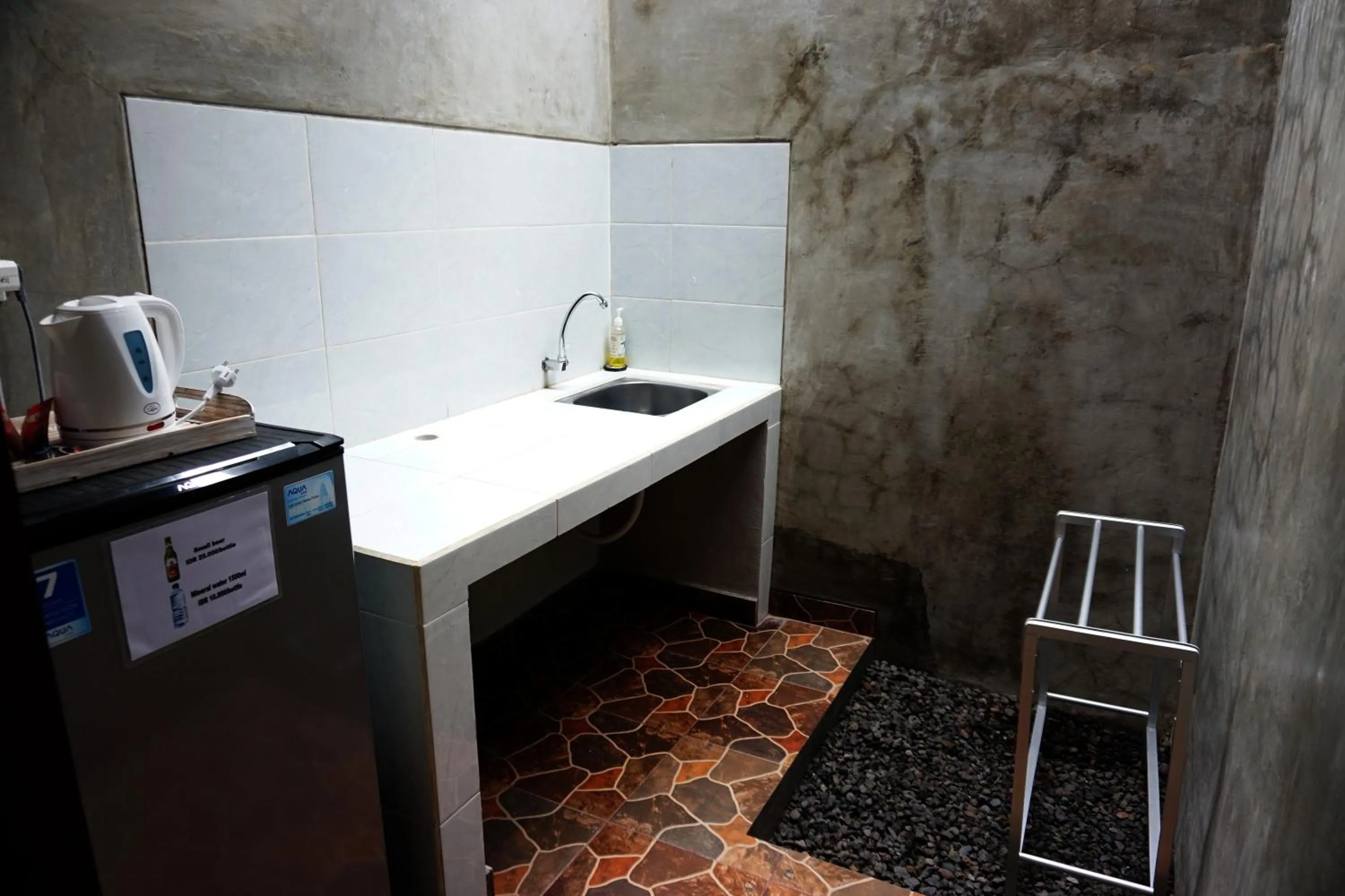Kitchen or kitchenette in Louto Dmell Villa & Guesthouse