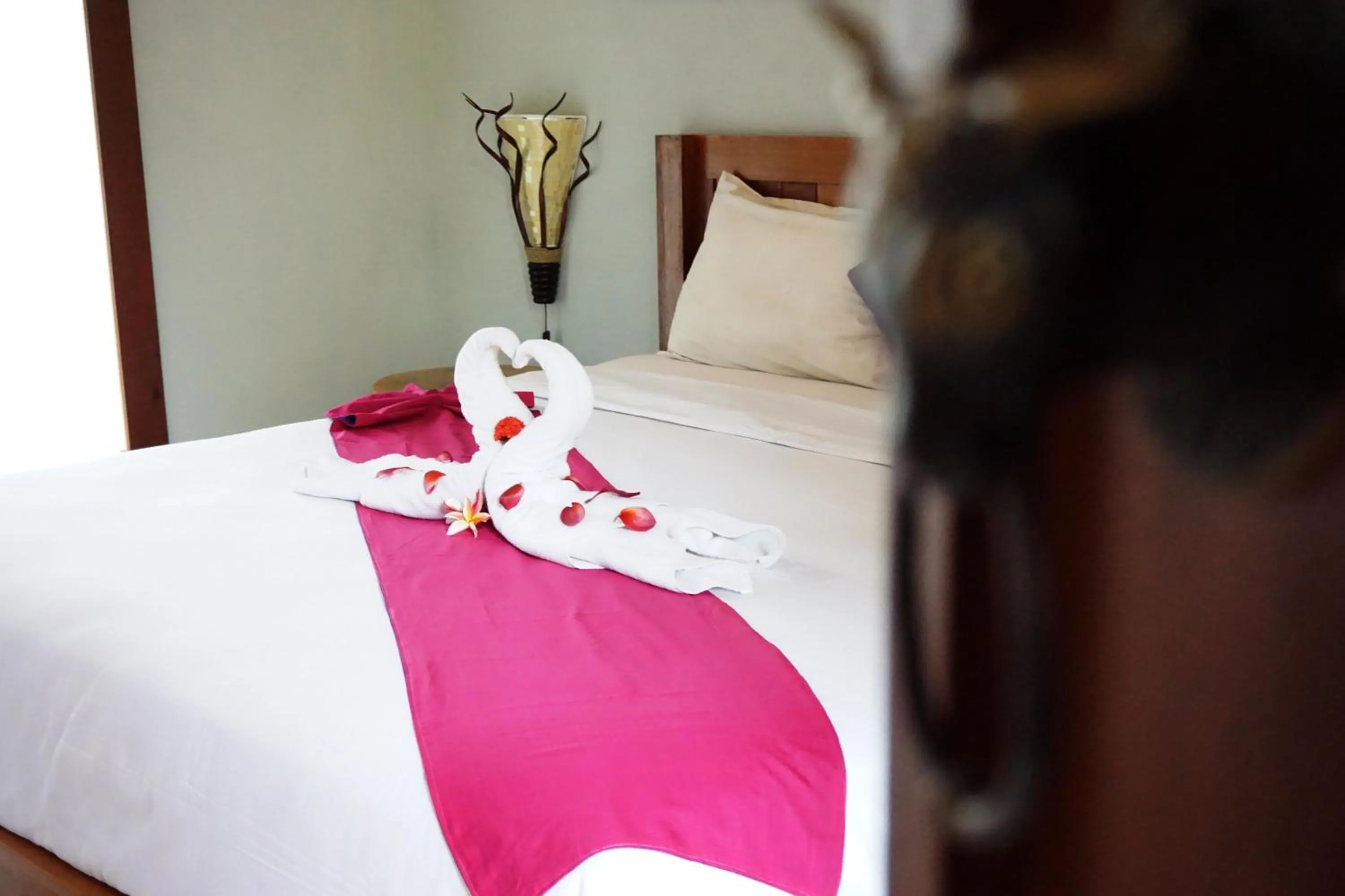 Bed in Louto Dmell Villa & Guesthouse