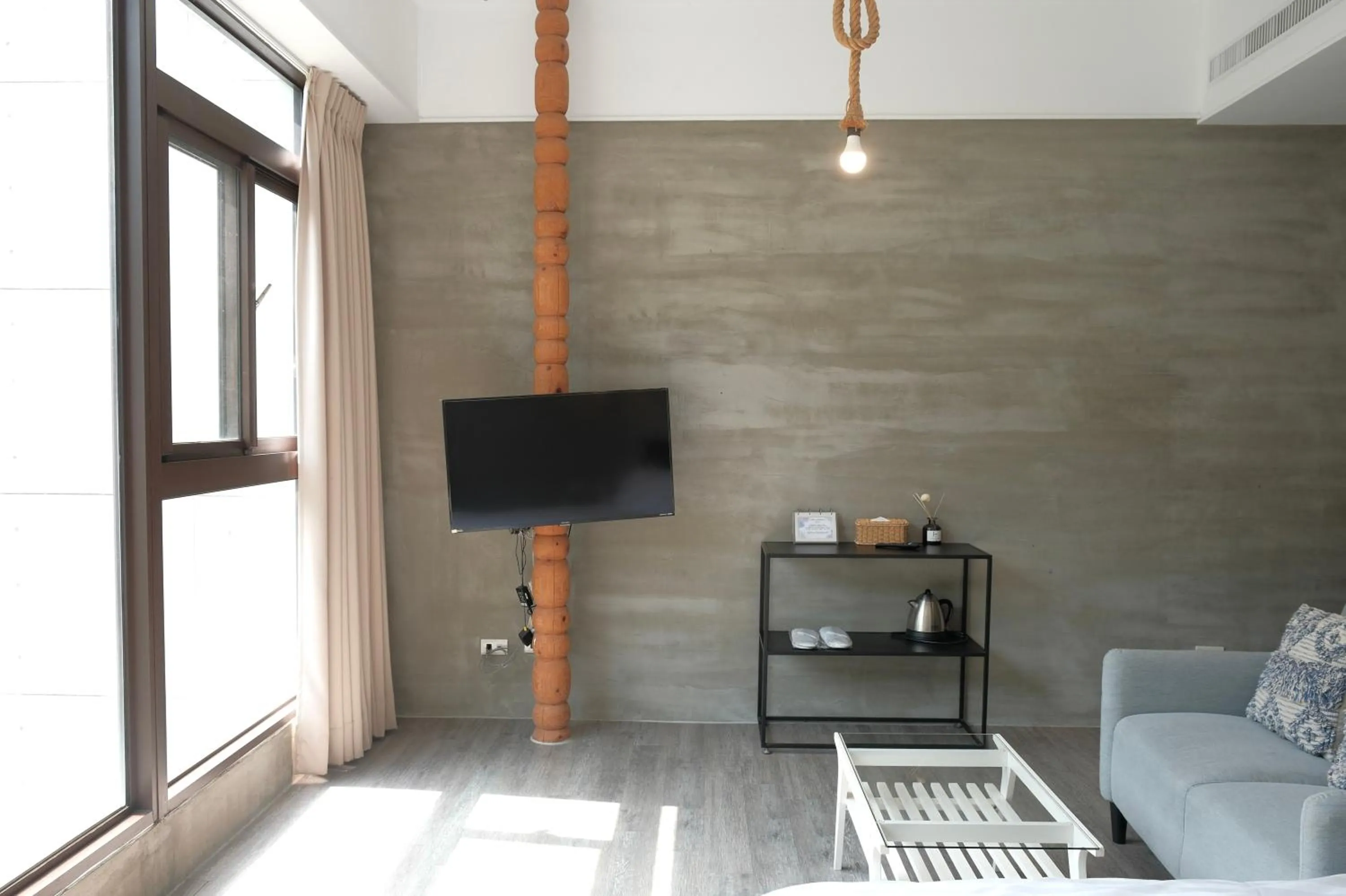 Living room in 愛黏在一起設計師民宿 Lovers BNB