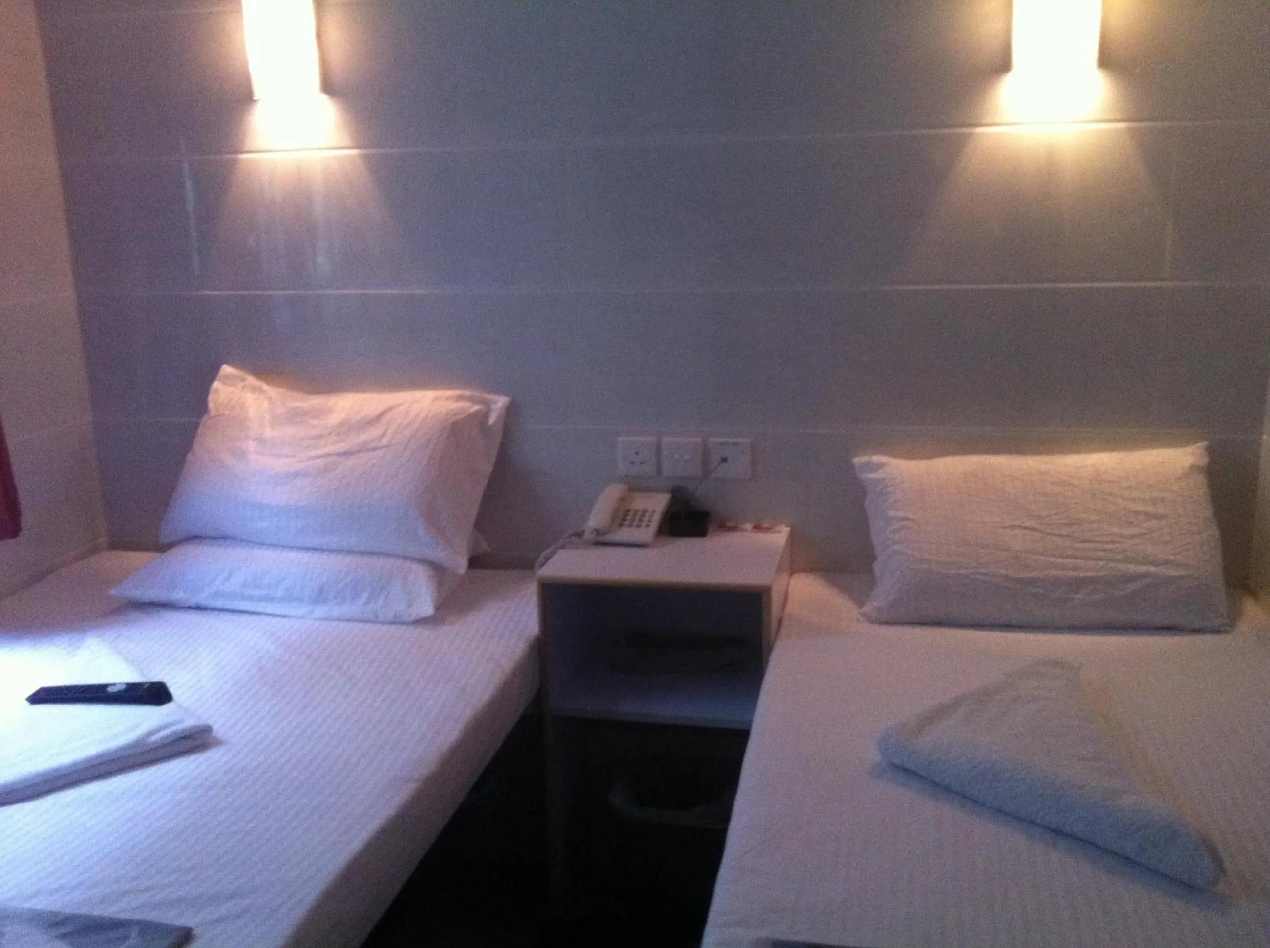 Photo of the whole room, Bed in New Cosmos Hotel