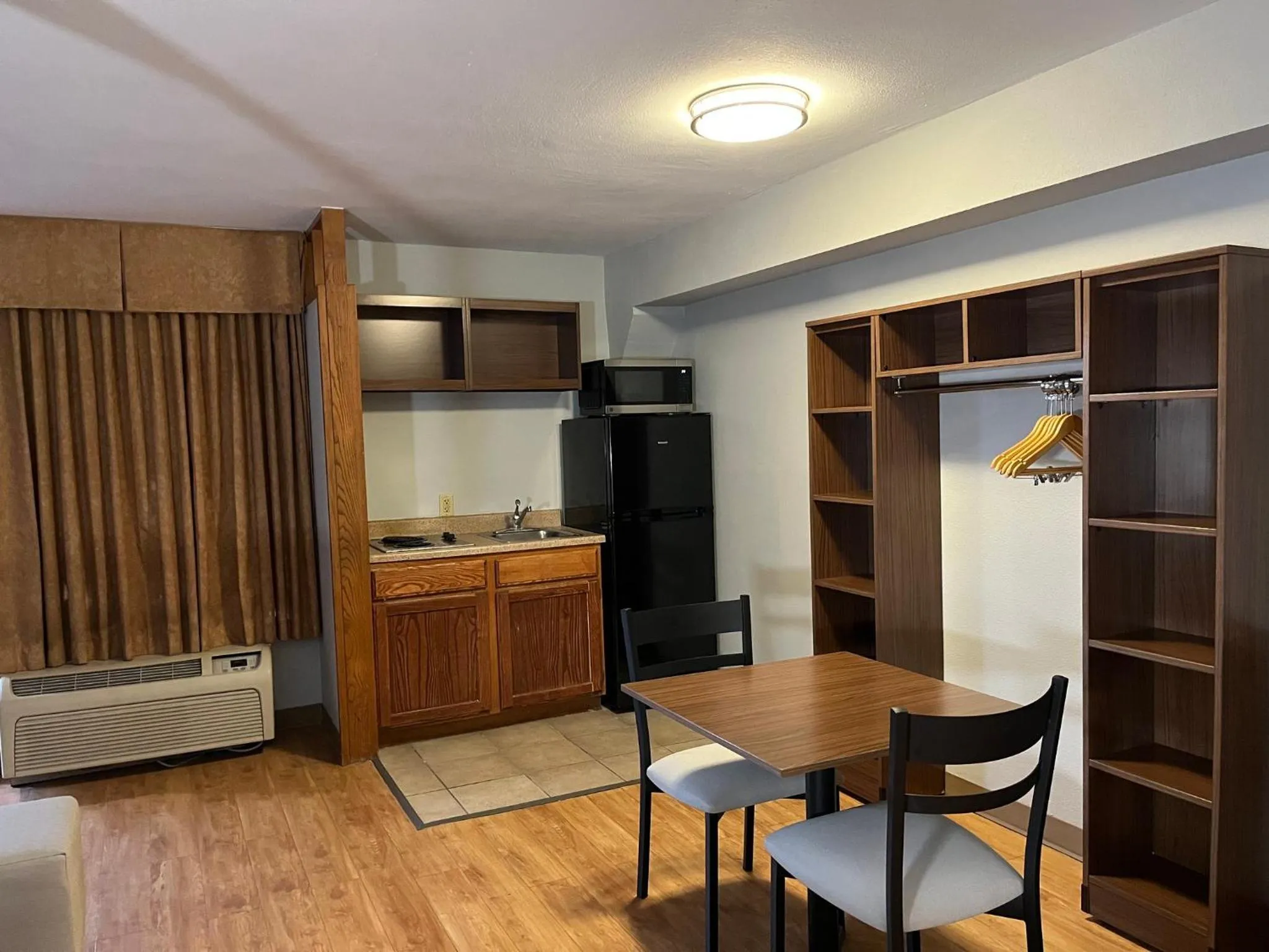 Bedroom in HomeTowne Studios by Red Roof Amarillo West