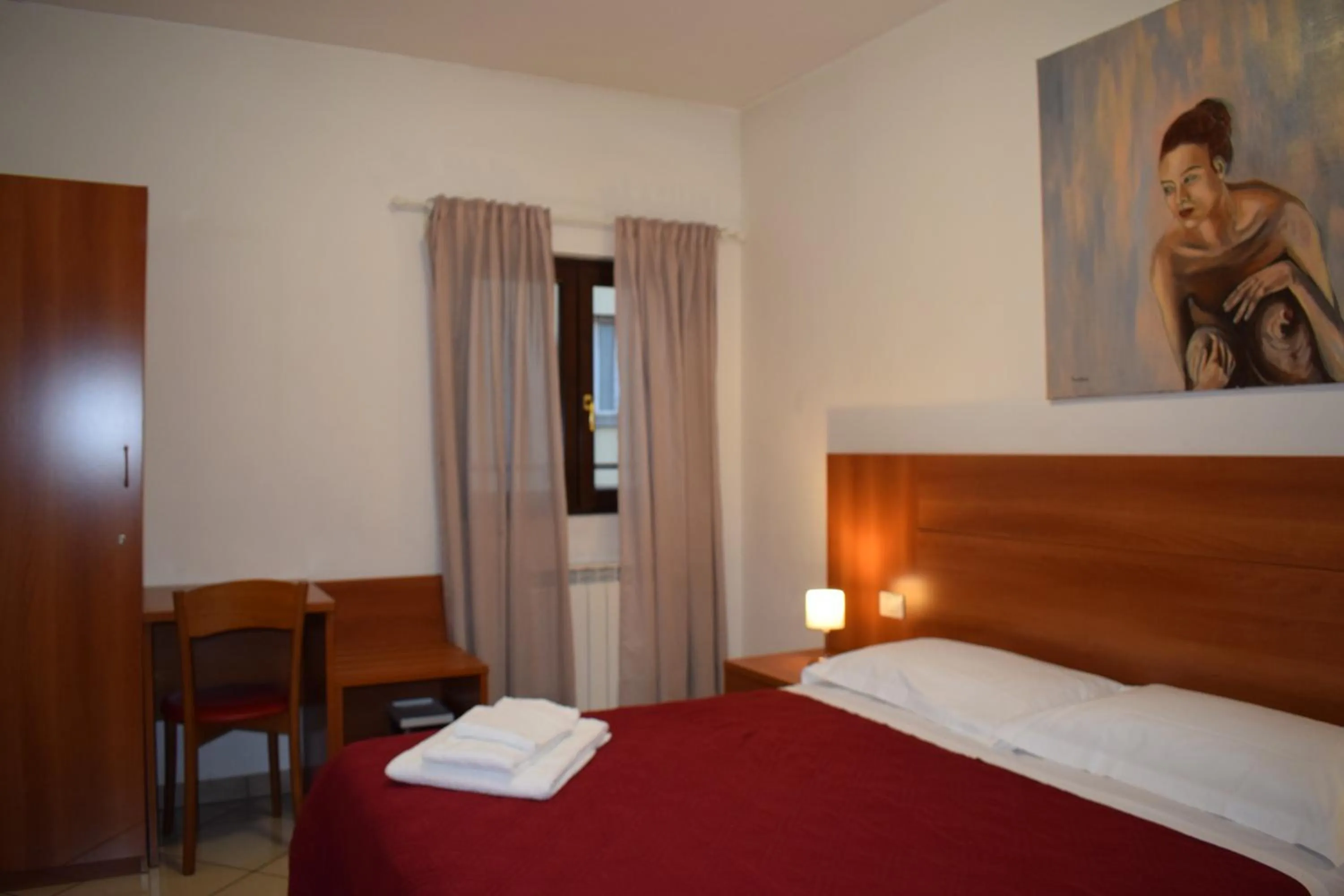 Bed in Hotel Dalmazia