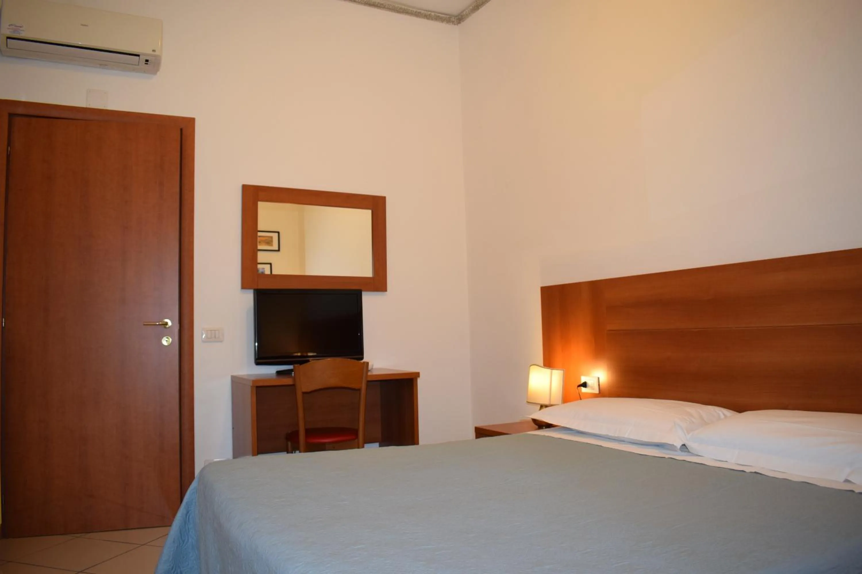 Bed in Hotel Dalmazia