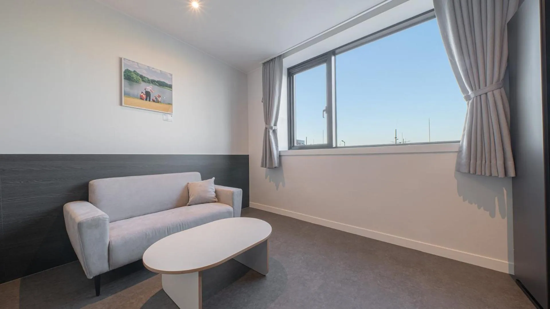 Seating area in Workers Hotel Daejeon by Aank