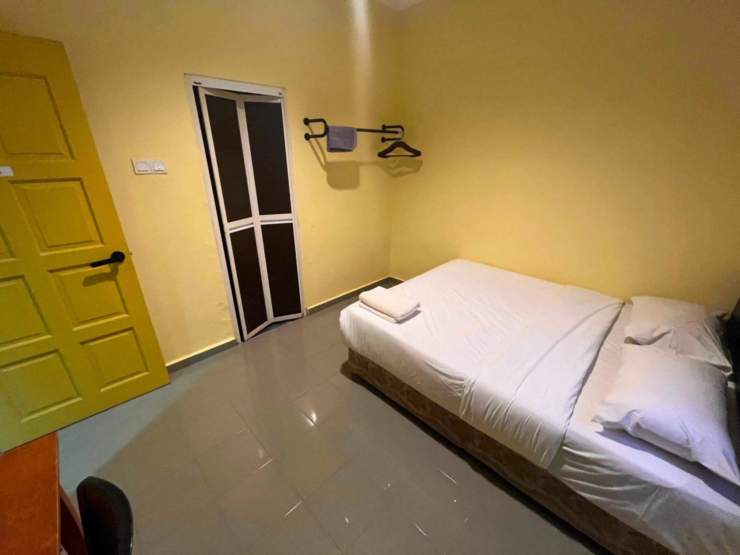 Bedroom, Bed in Hotel O RAHMAH SOJOURN CENTRE