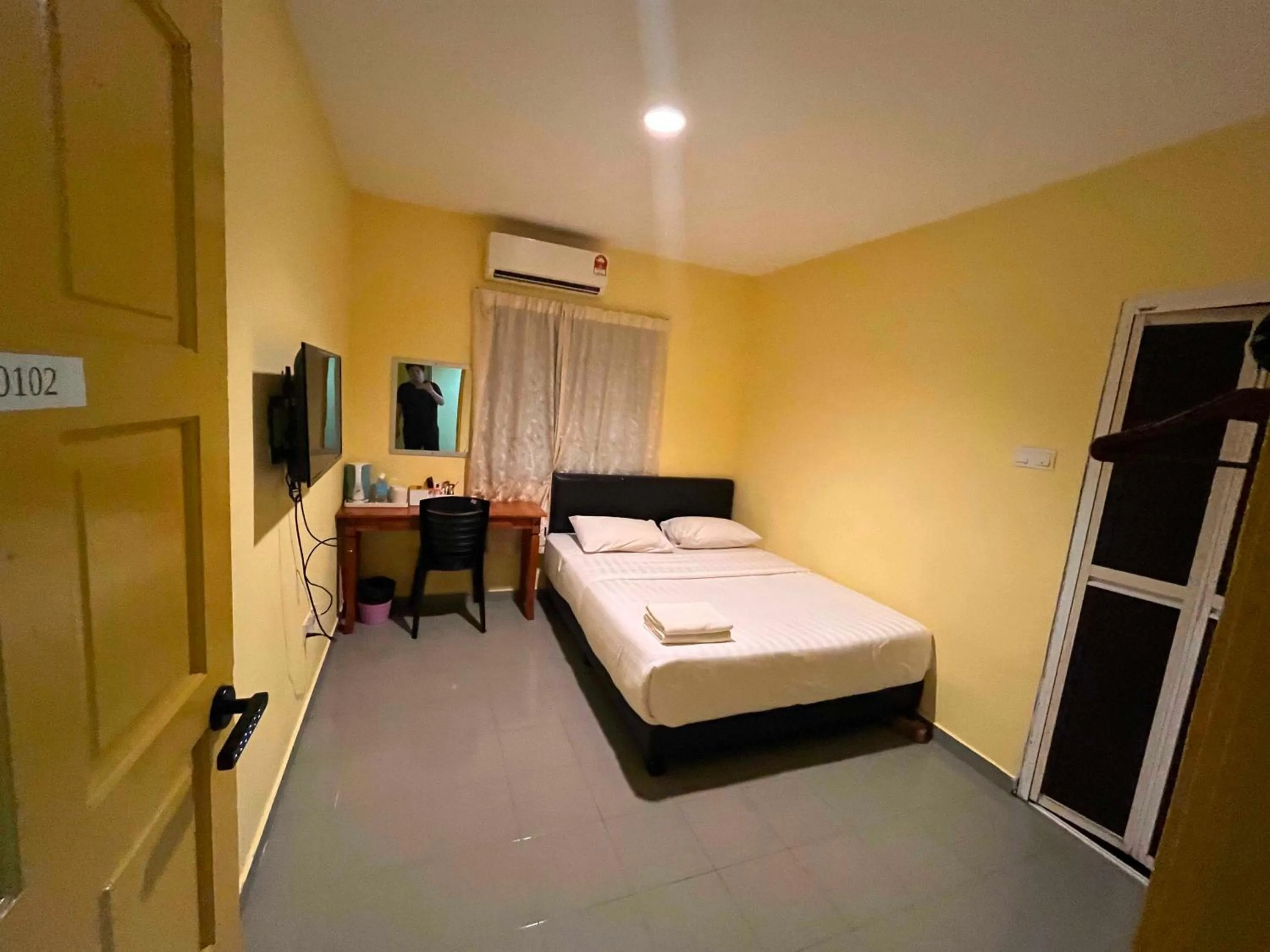 Bedroom, Bed in Hotel O RAHMAH SOJOURN CENTRE