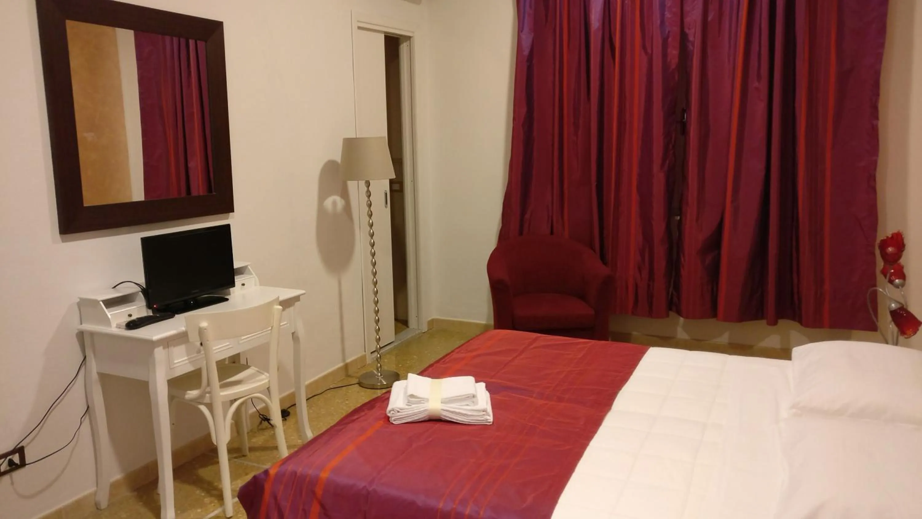 Bed in Casamare Hotel