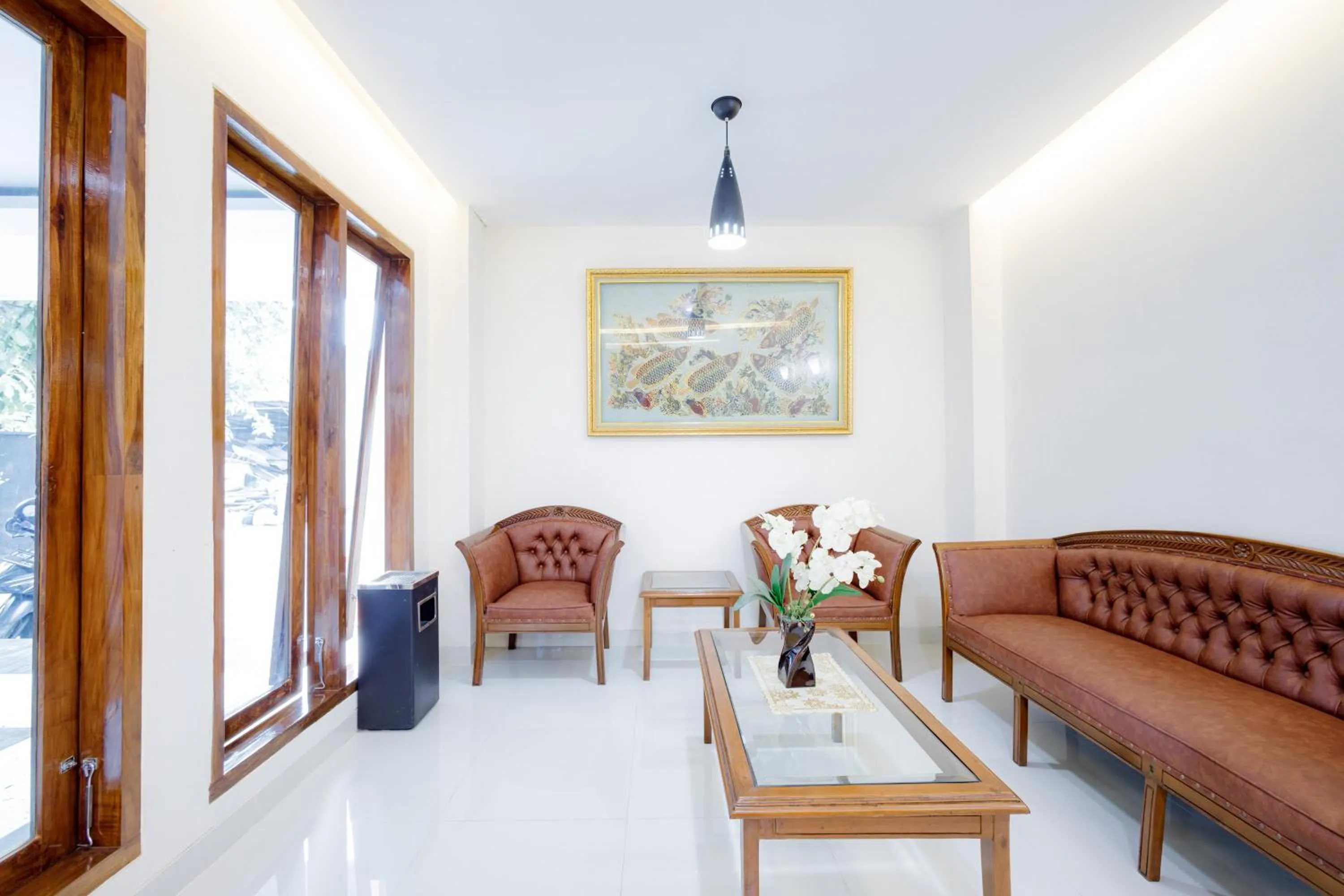 Living room in Urbanview Hotel Syariah The Ragunan Residence