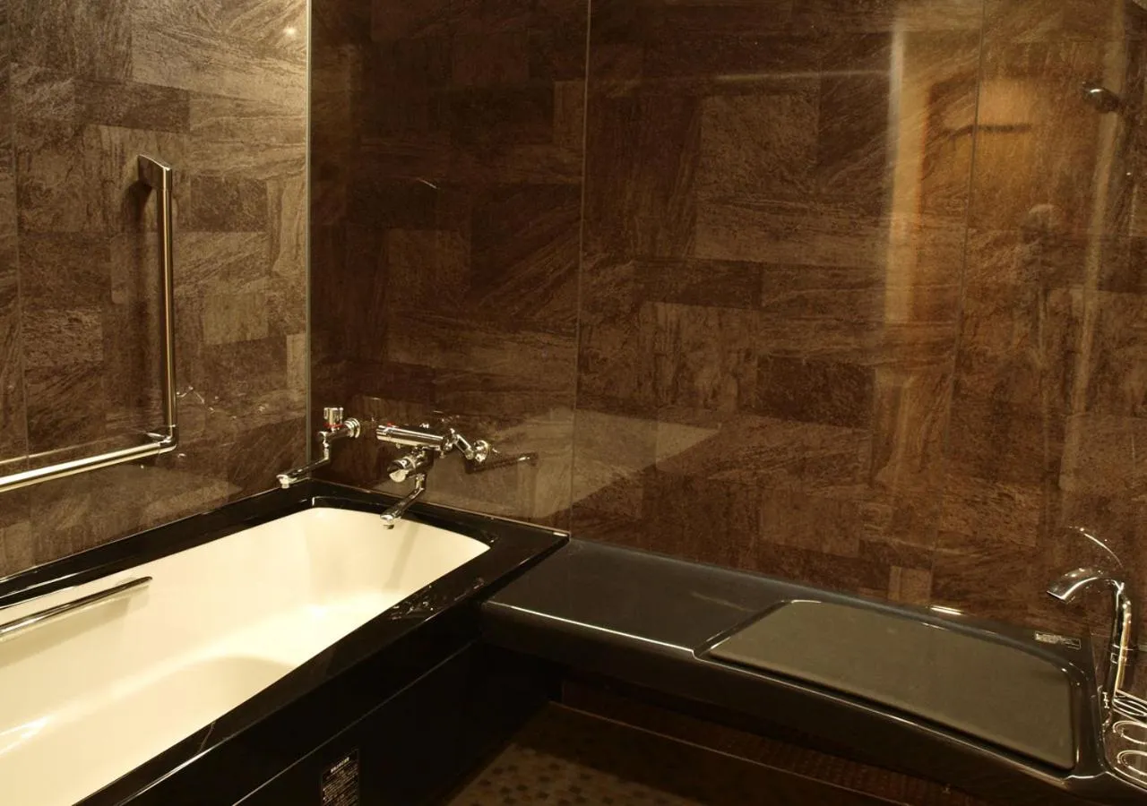 Bathroom in Niseko Hot Spring Ikoino Yuyado Iroha