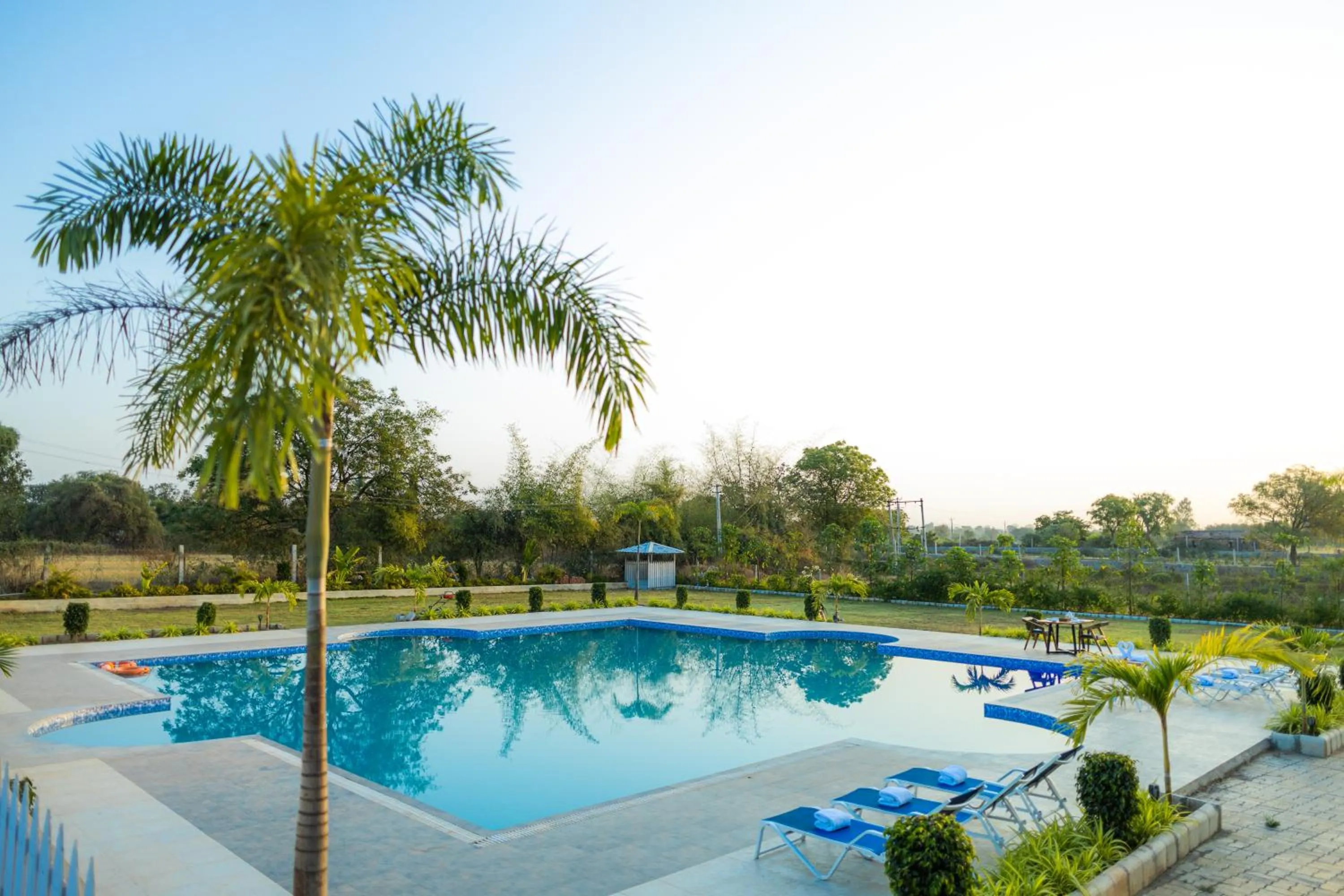 Swimming pool in Daksh Eden Greenz -A Luxury Resort in Sasan Gir