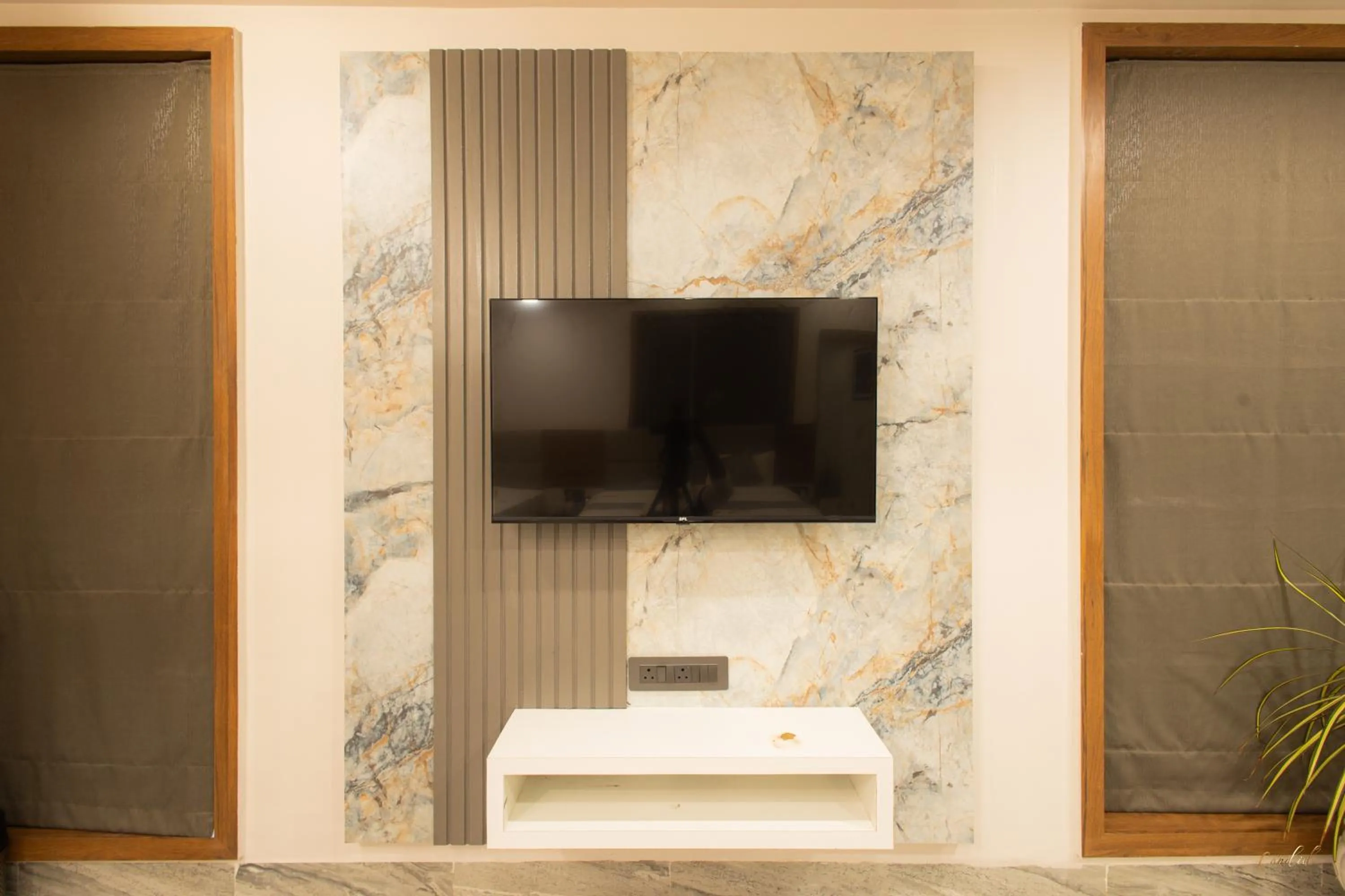 TV and multimedia in Daksh Eden Greenz -A Luxury Resort in Sasan Gir