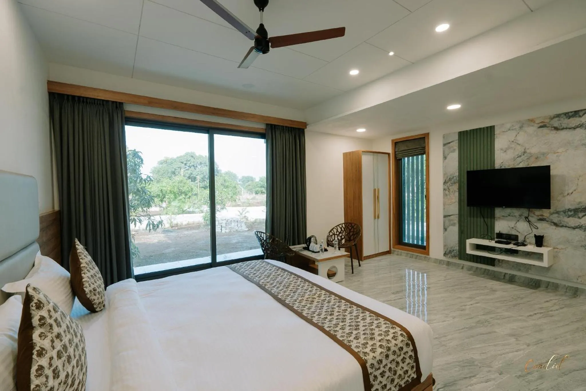 Bedroom, Bed in Daksh Eden Greenz -A Luxury Resort in Sasan Gir