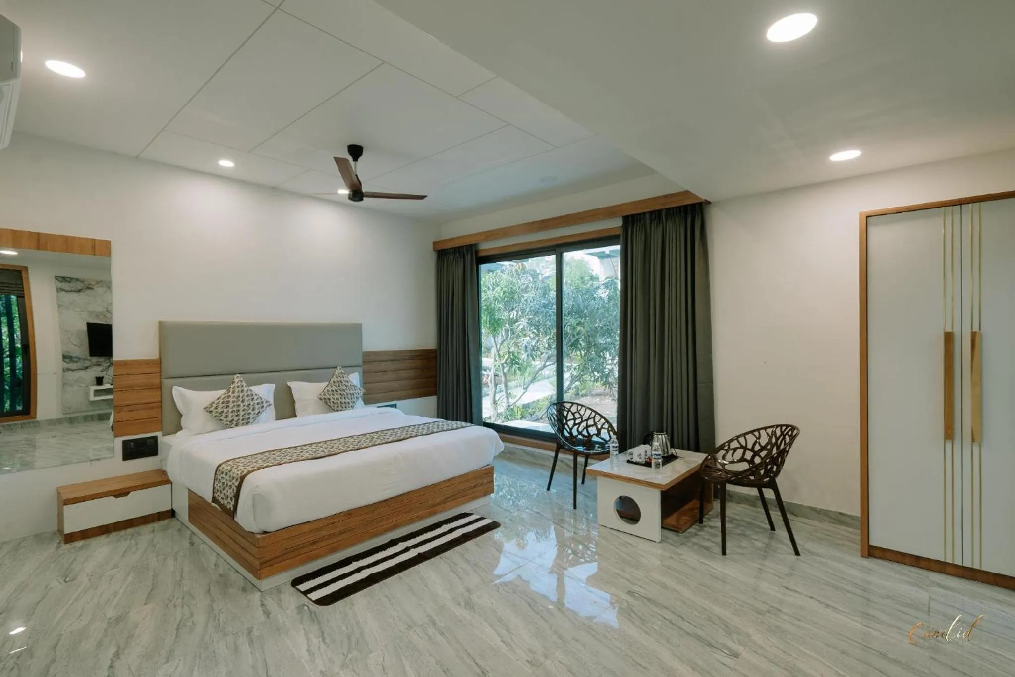 Bed in Daksh Eden Greenz -A Luxury Resort in Sasan Gir