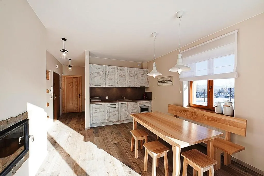 Kitchen or kitchenette in Apartamenty Lipki Park, Sun & Snow