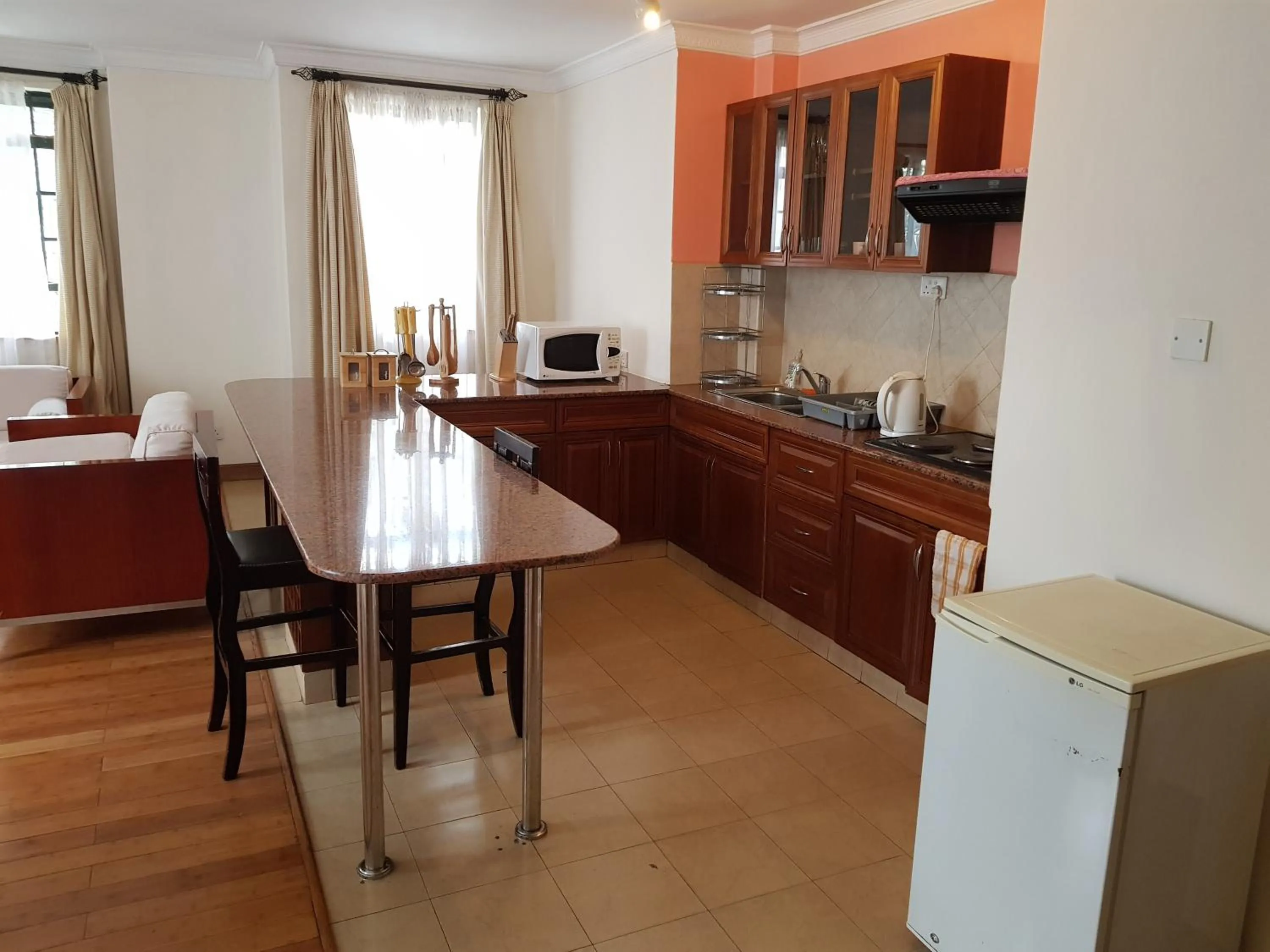 Kitchen or kitchenette in Natural Oak Apartments