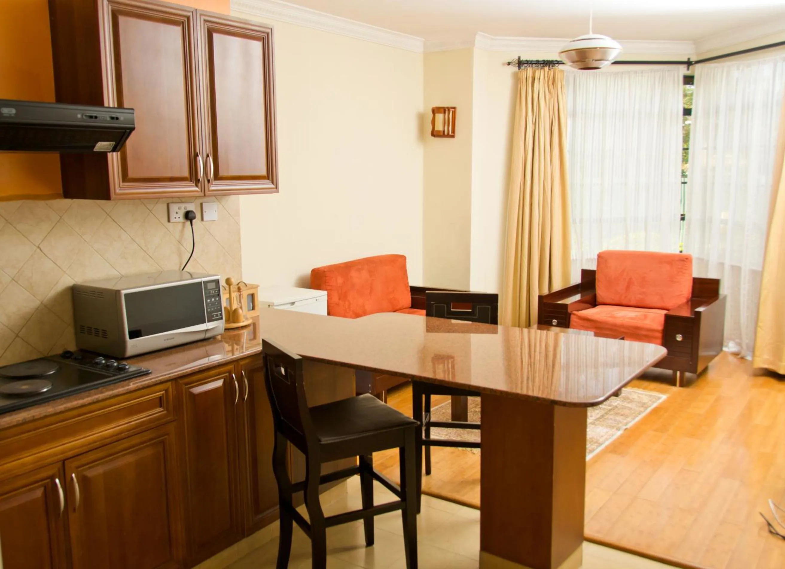 Kitchen or kitchenette in Natural Oak Apartments