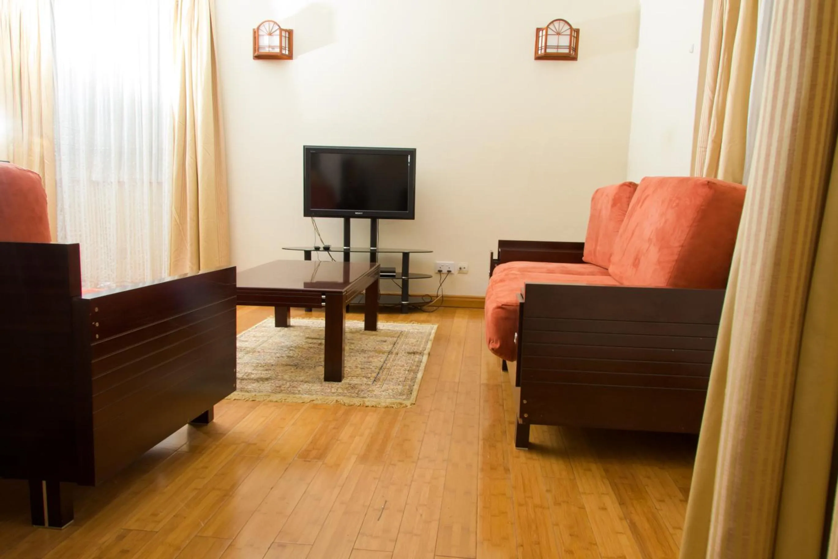 Living room in Natural Oak Apartments