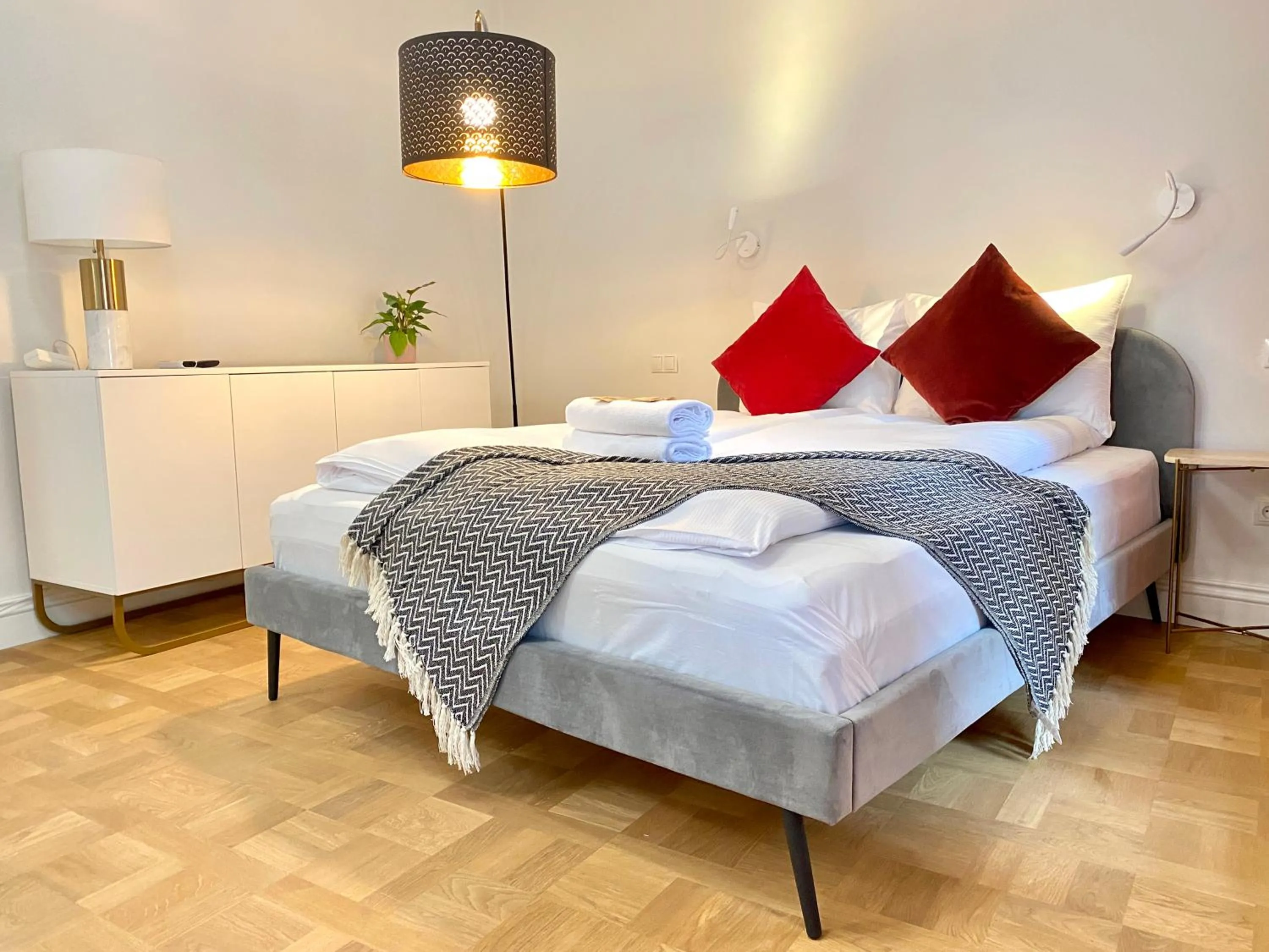 Bed in MINT Luxury Apartments at the Main Square