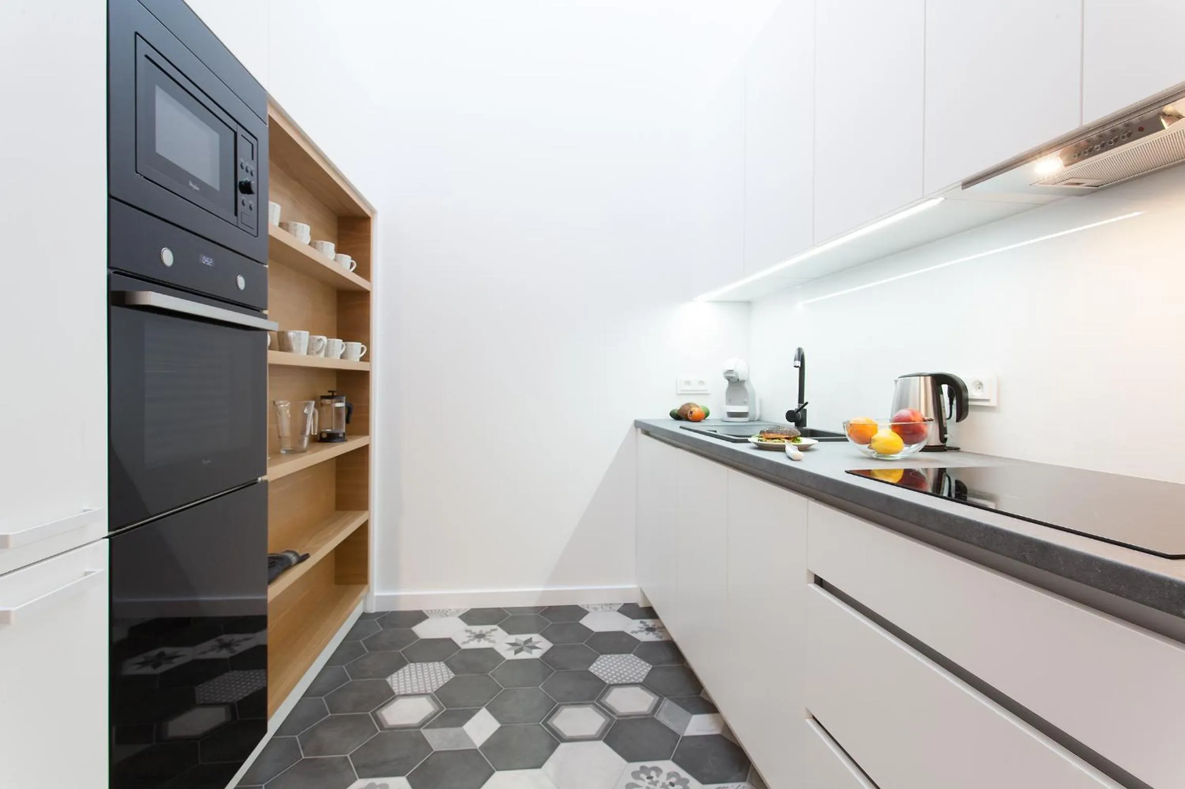 Kitchen or kitchenette in MINT Luxury Apartments at the Main Square