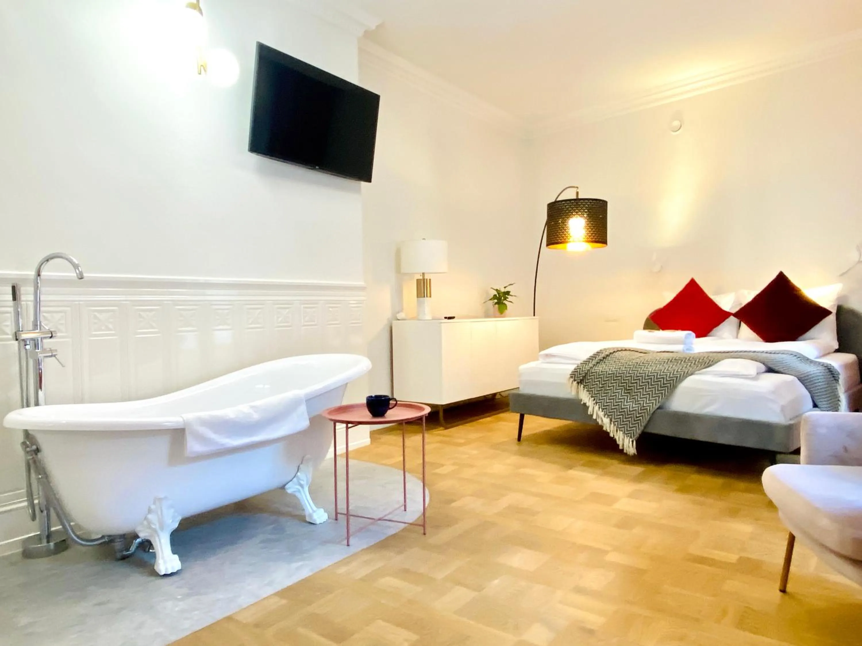 Bed in MINT Luxury Apartments at the Main Square