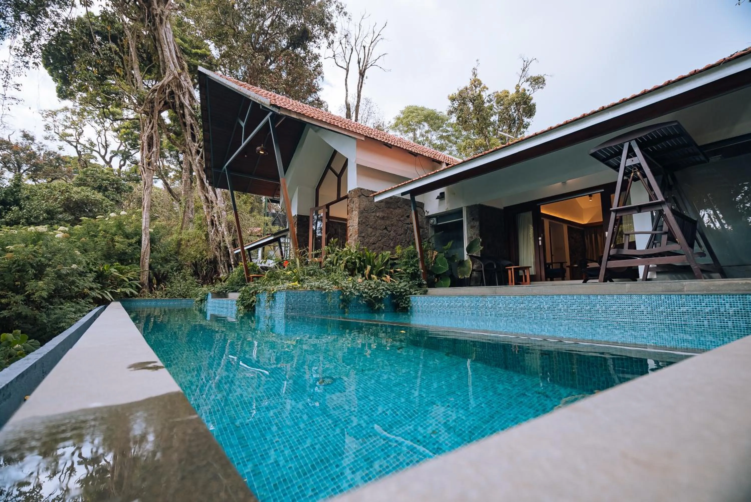 Swimming pool in Elixir Woods Luxury Resort And Spa, Munnar