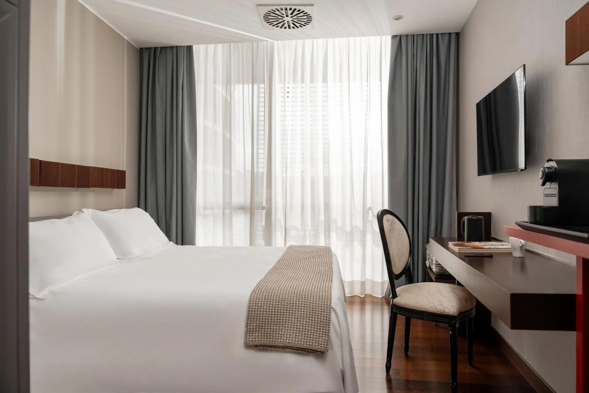 Bed in Welcome Hotel