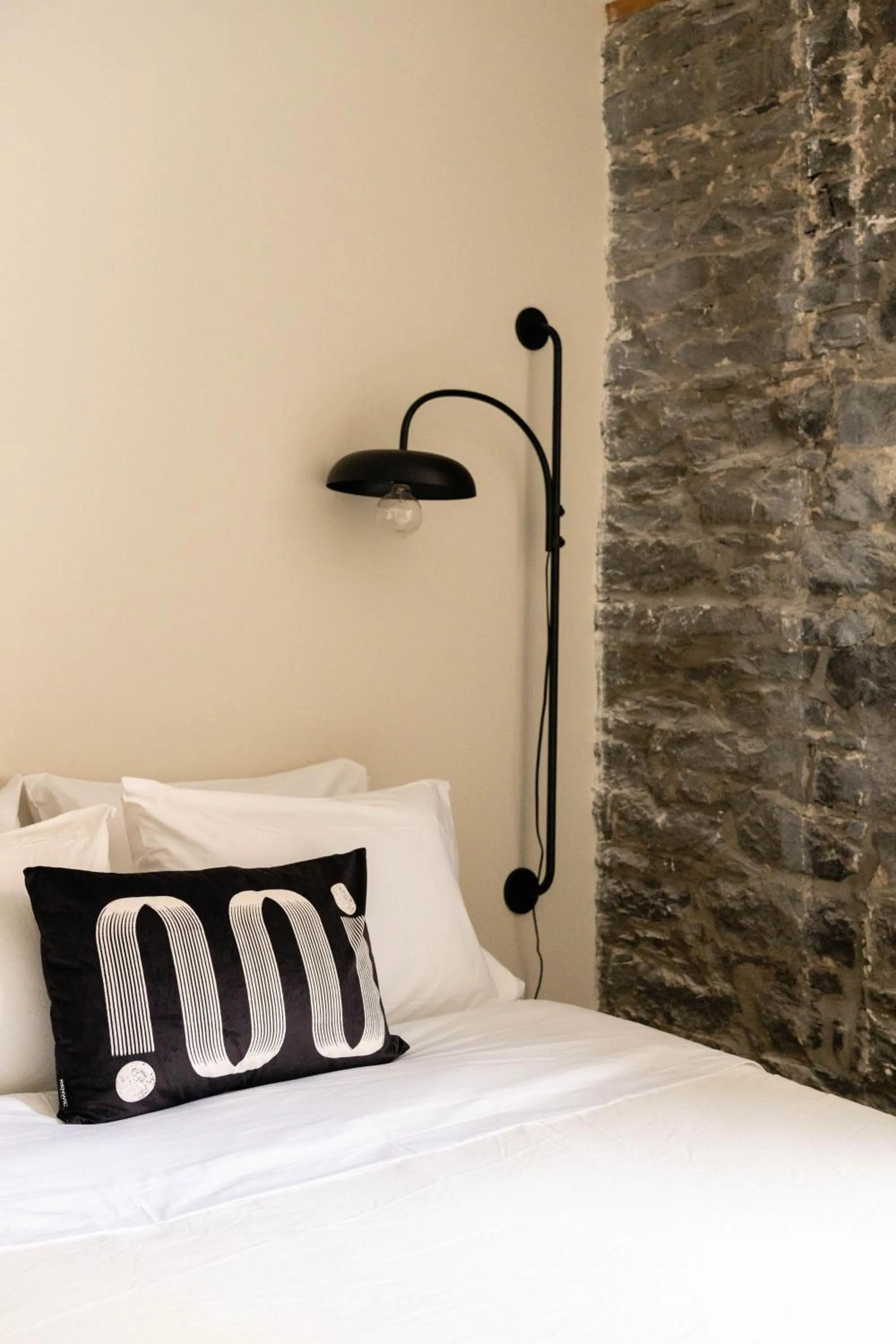 Bed in Maison Place Royale by Luxury In Transit