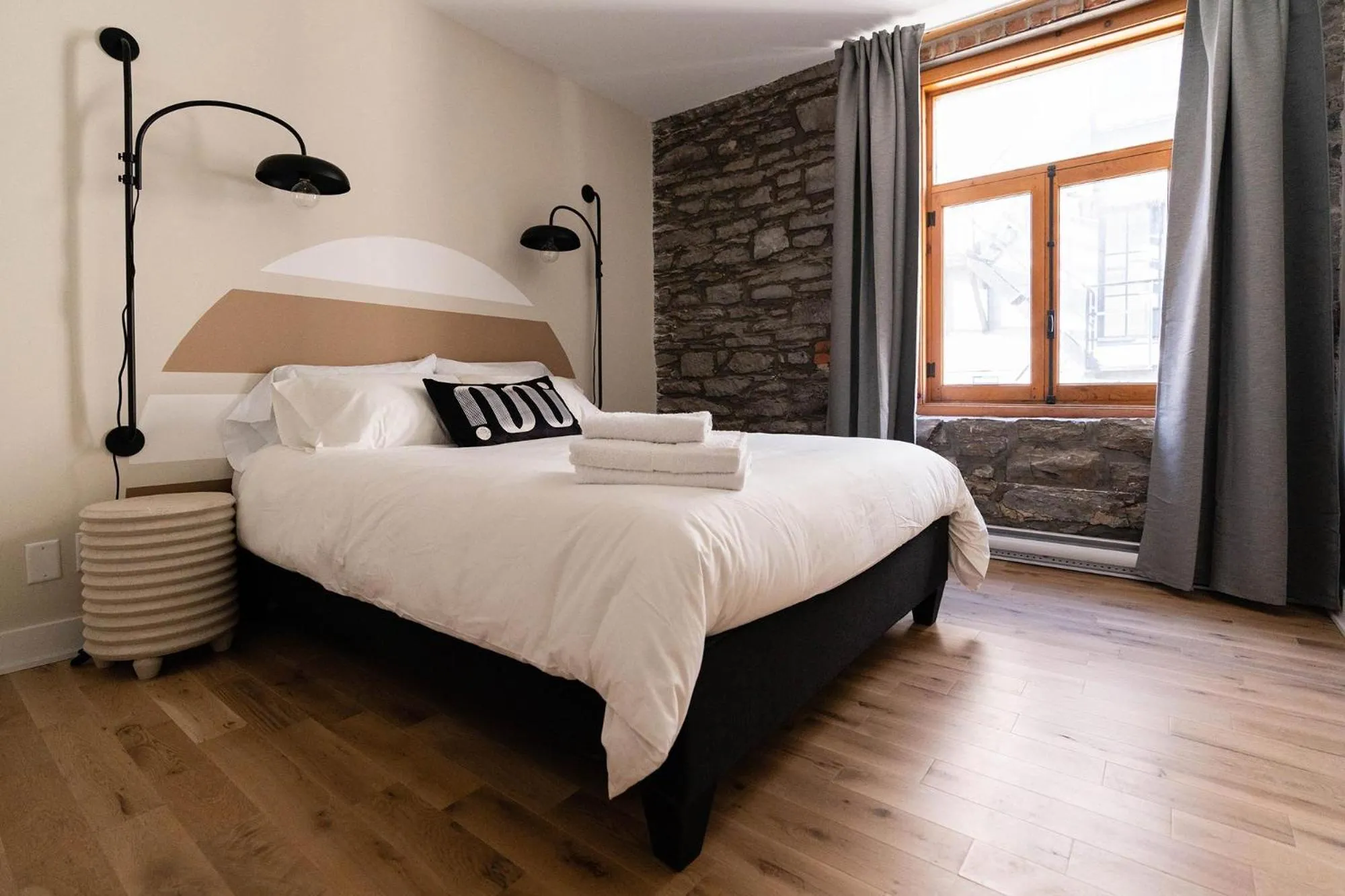 Bed in Maison Place Royale by Luxury In Transit