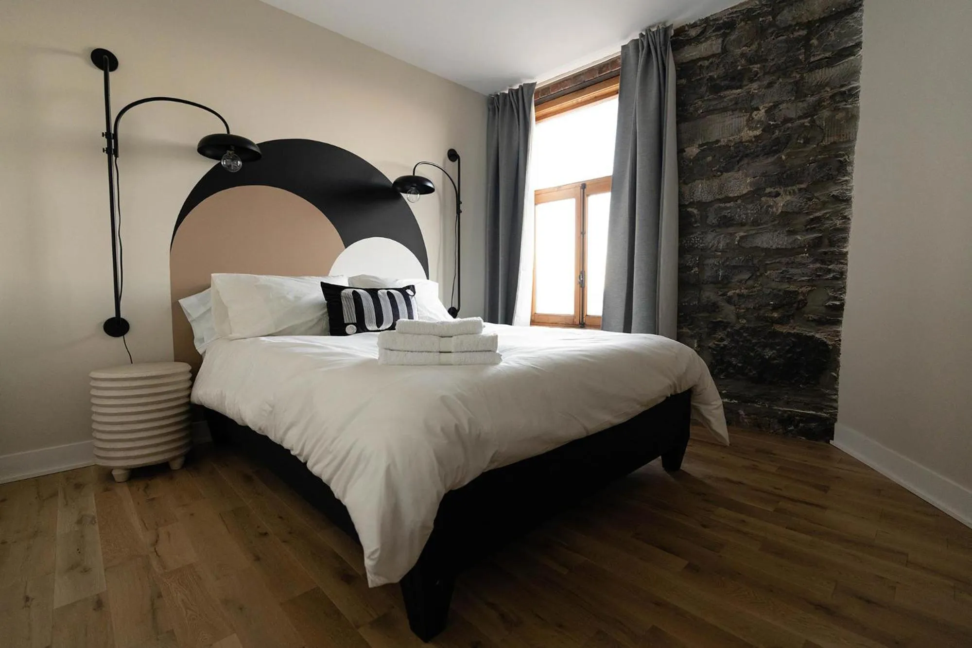 Bed in Maison Place Royale by Luxury In Transit