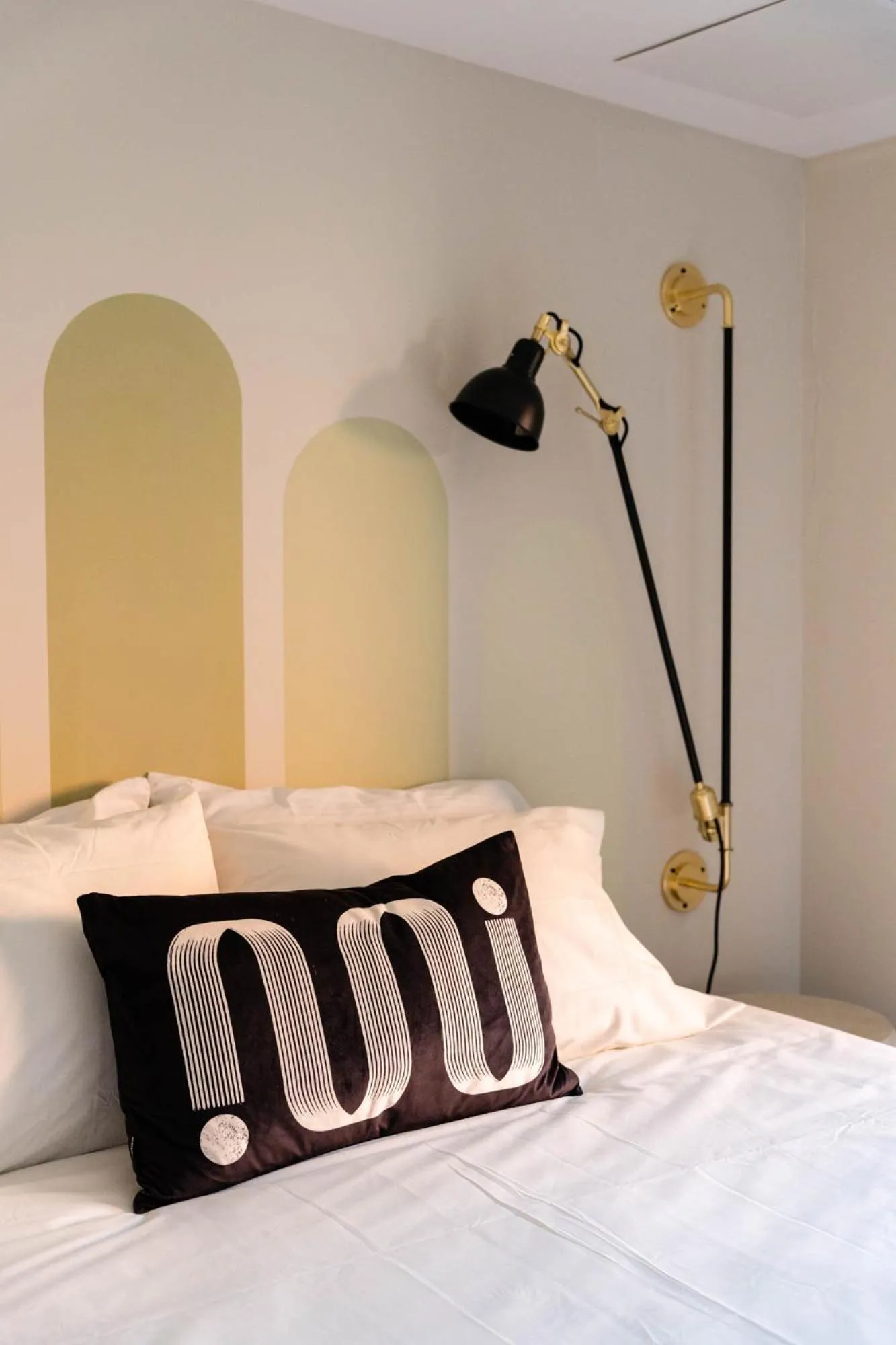 Bed in Maison Place Royale by Luxury In Transit