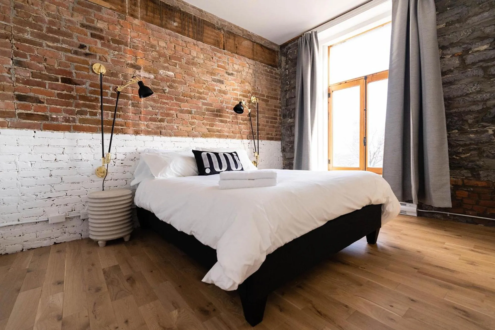 Bed in Maison Place Royale by Luxury In Transit