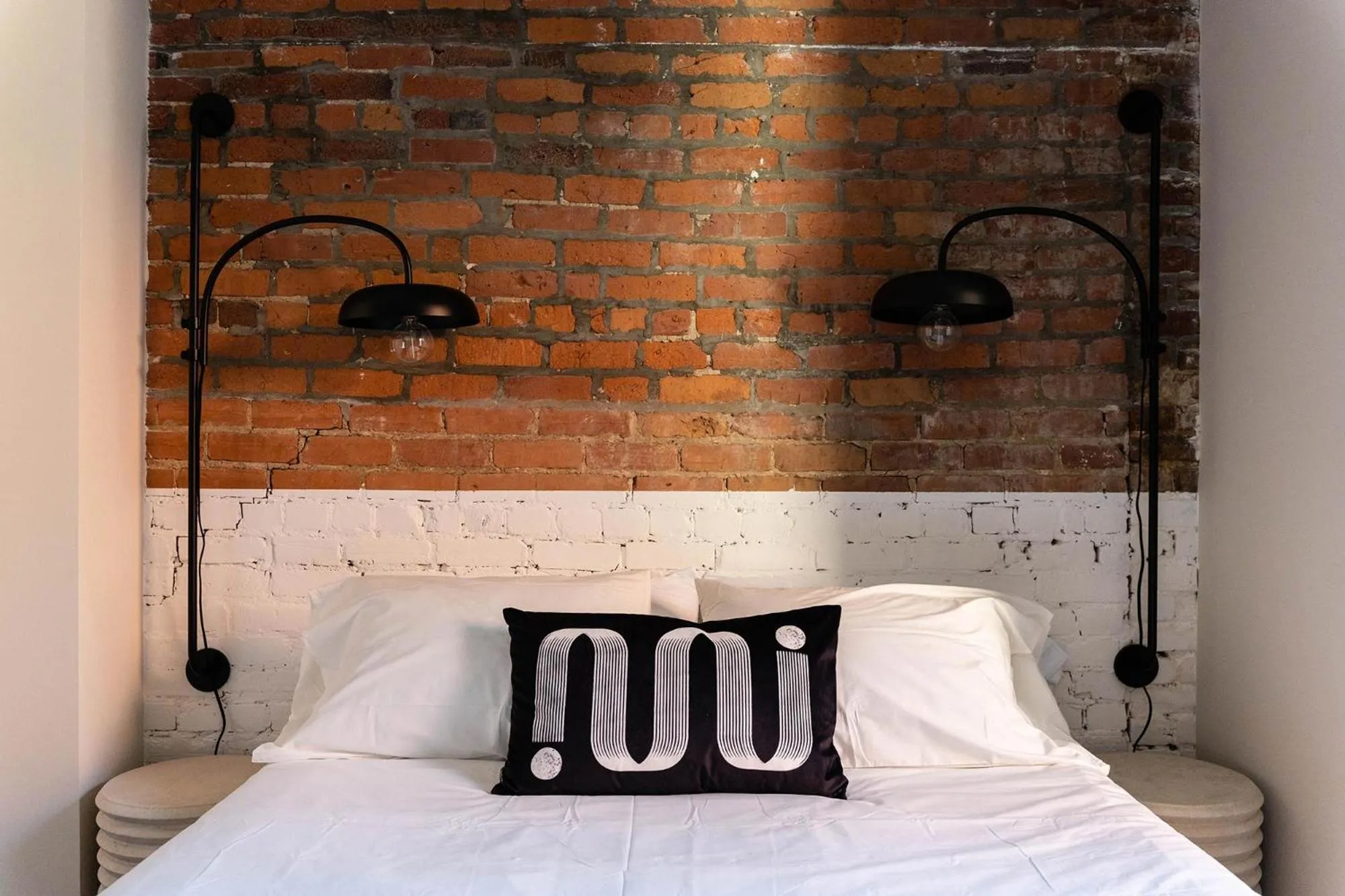 Bed in Maison Place Royale by Luxury In Transit