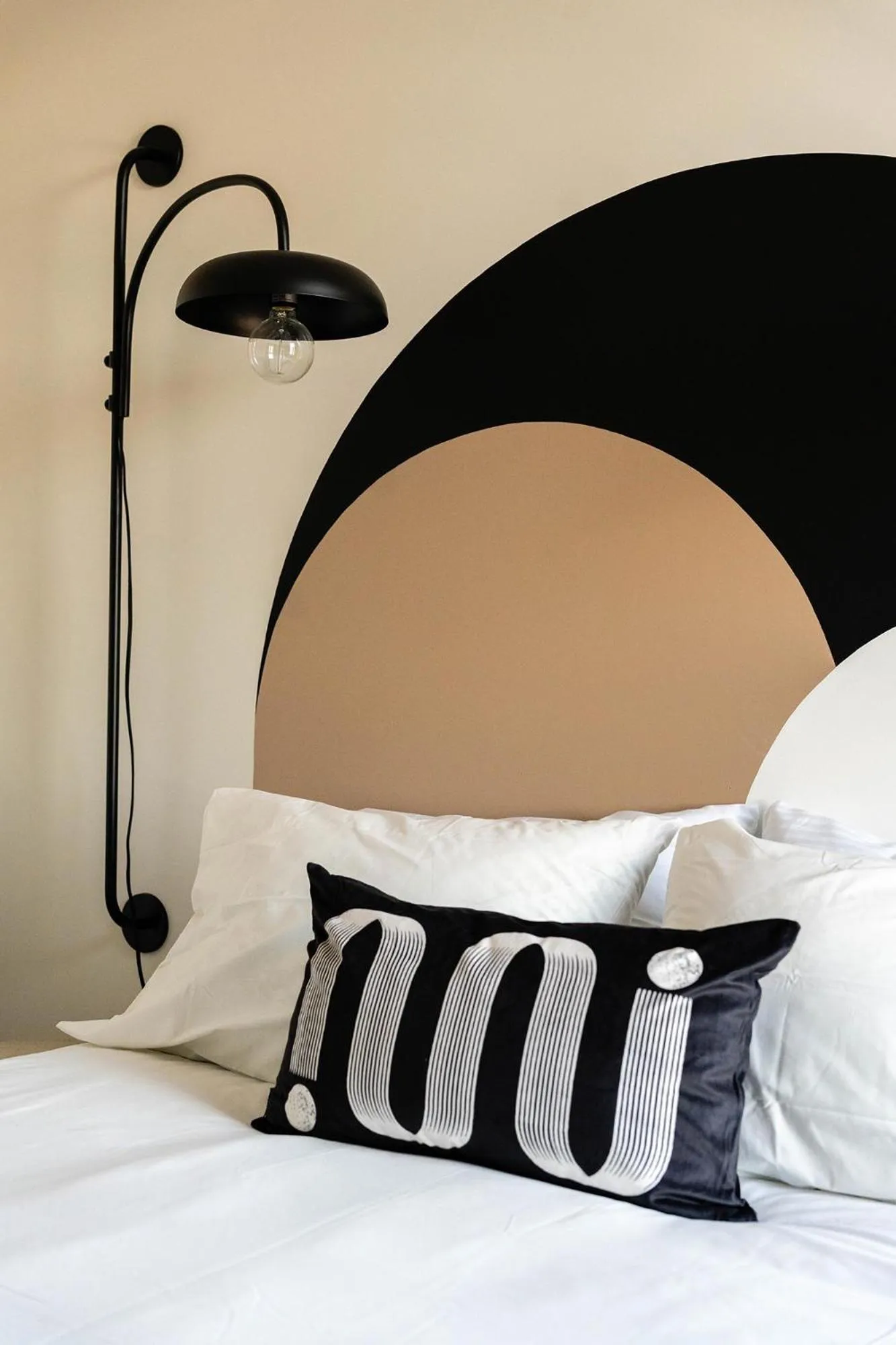 Bed in Maison Place Royale by Luxury In Transit