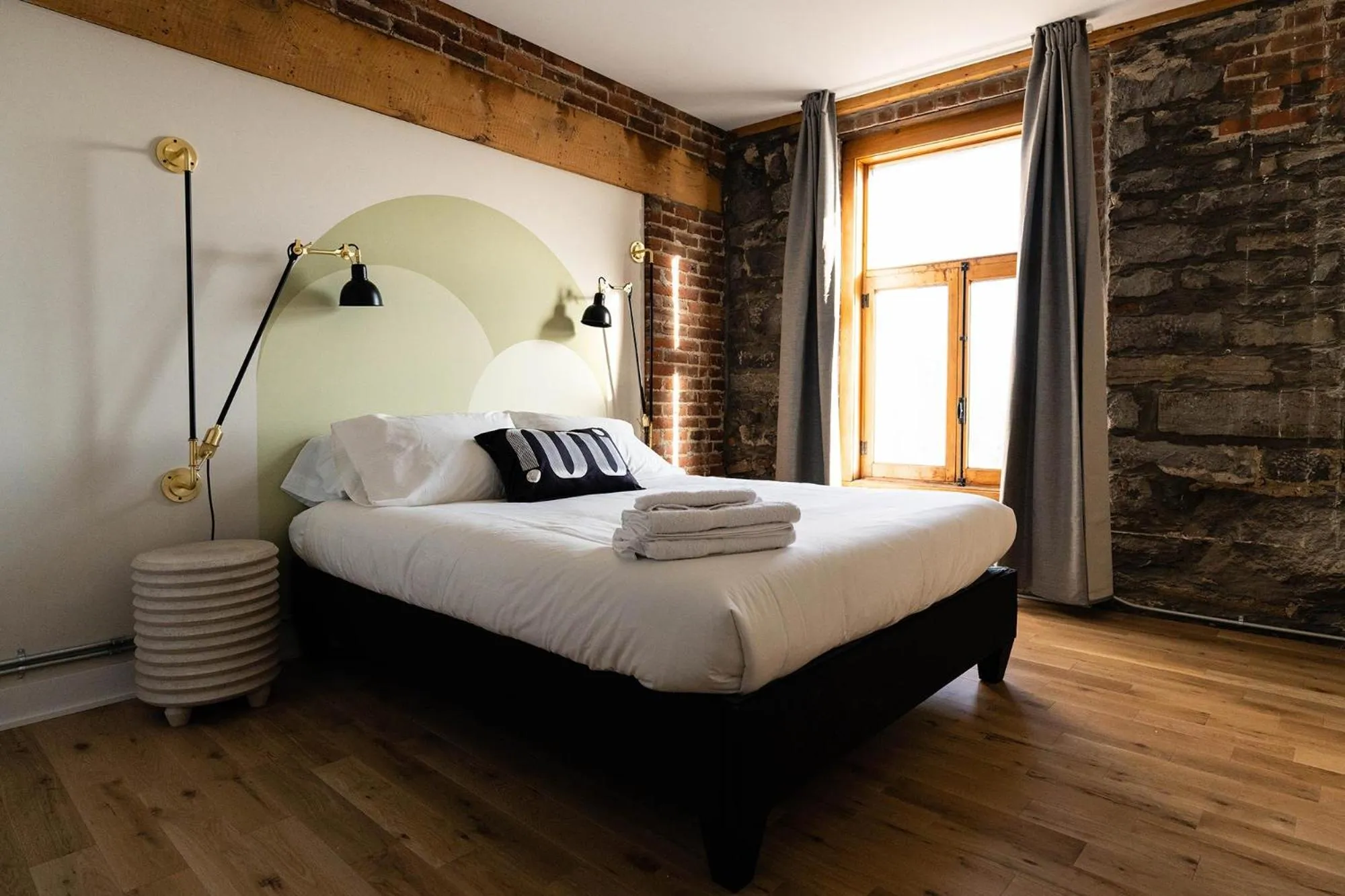 Bed in Maison Place Royale by Luxury In Transit