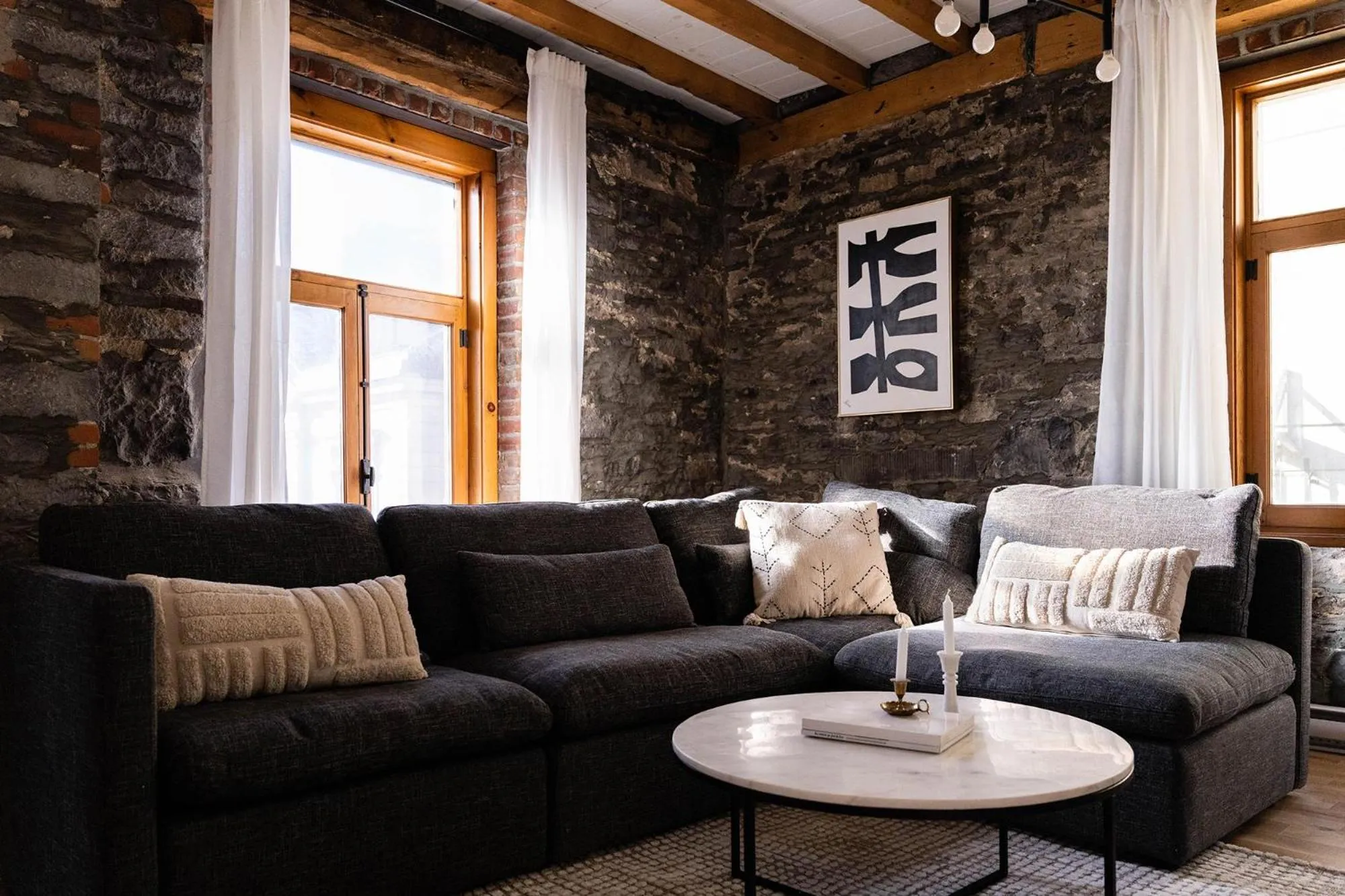 Living room in Maison Place Royale by Luxury In Transit