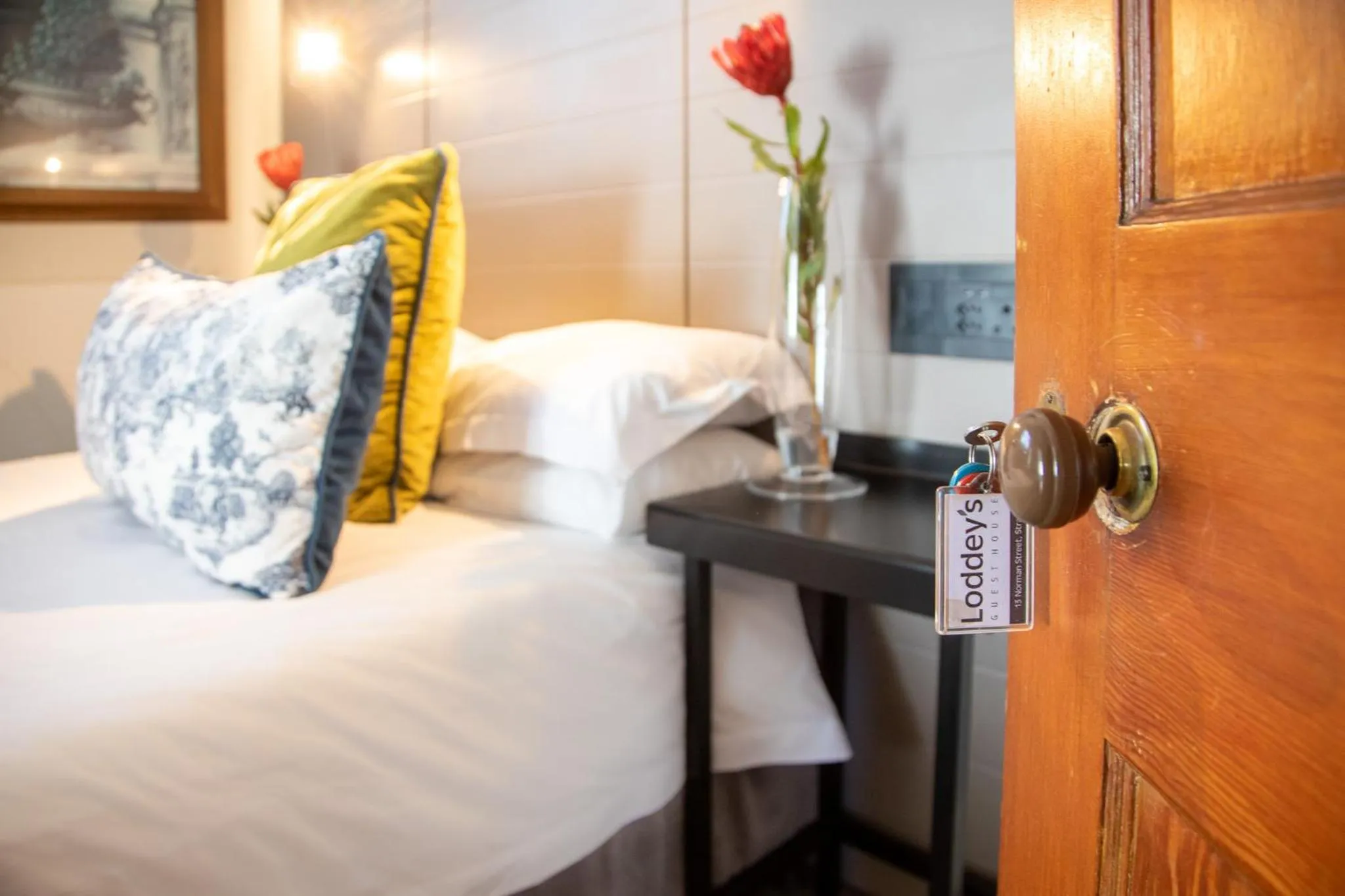 Decorative detail, Bed in Loddey`s Guest House - by Beach Collection