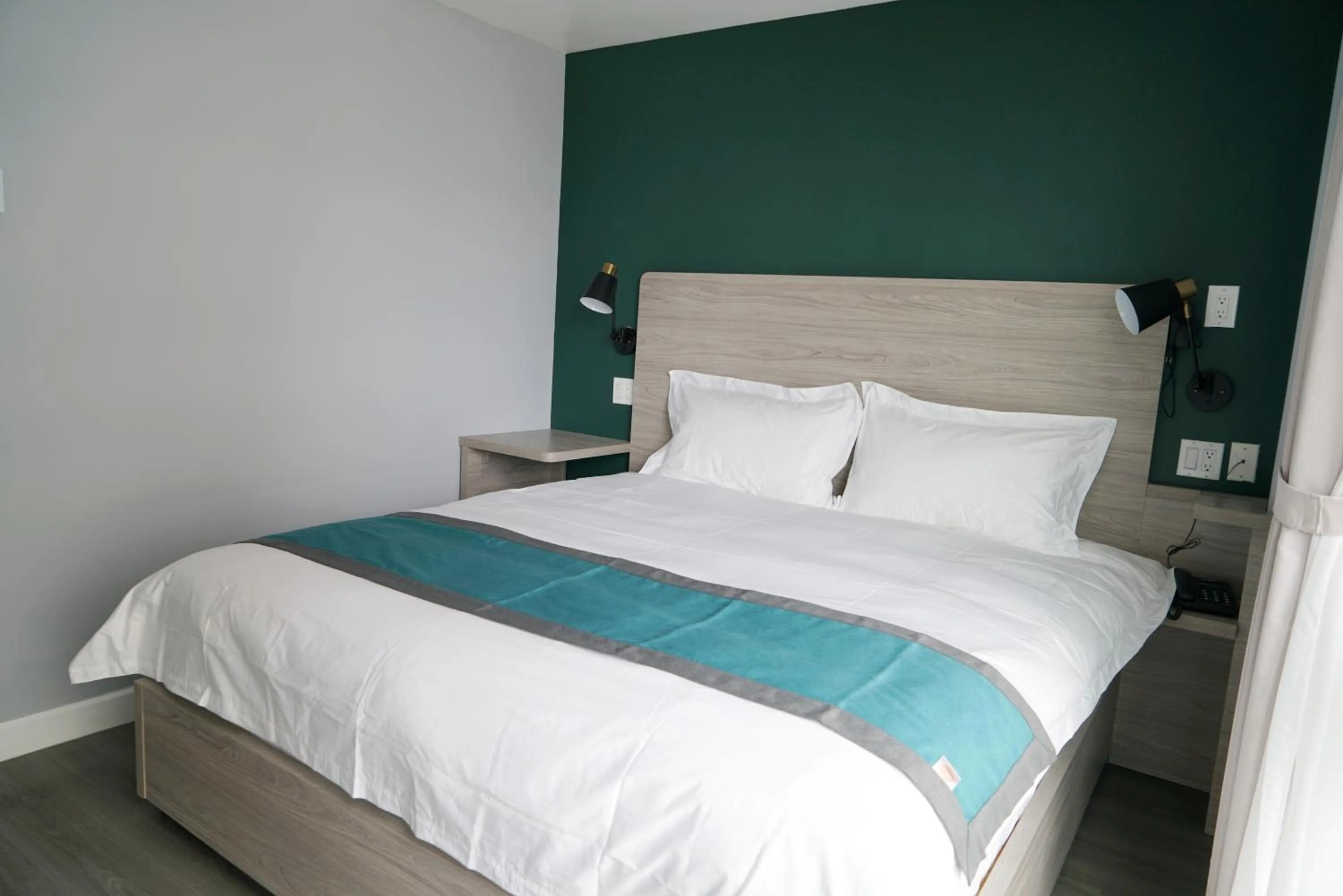 Bed in Starlight Hotel