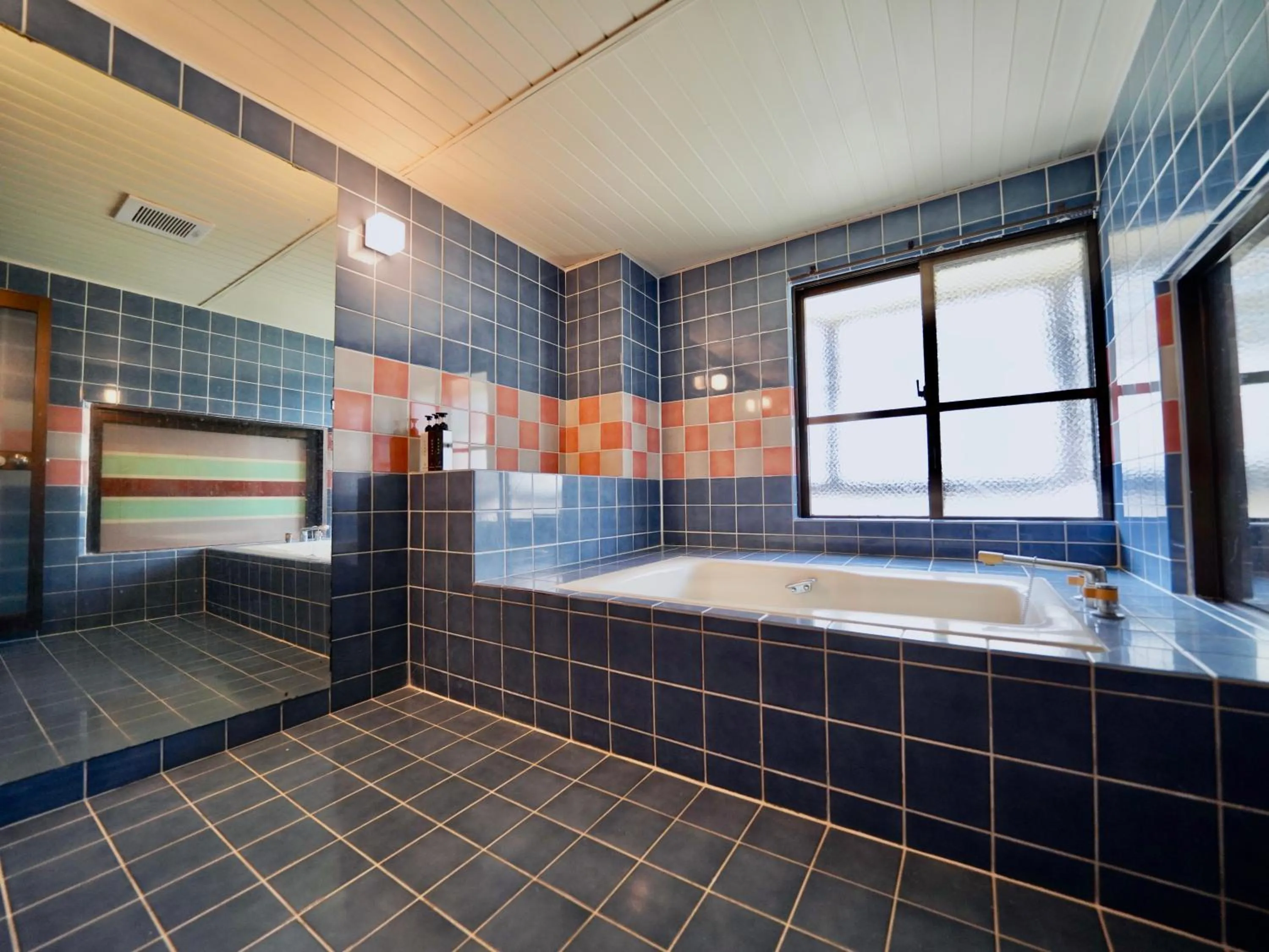 Bathroom in Hotel Ishigaki and Chikonkiya